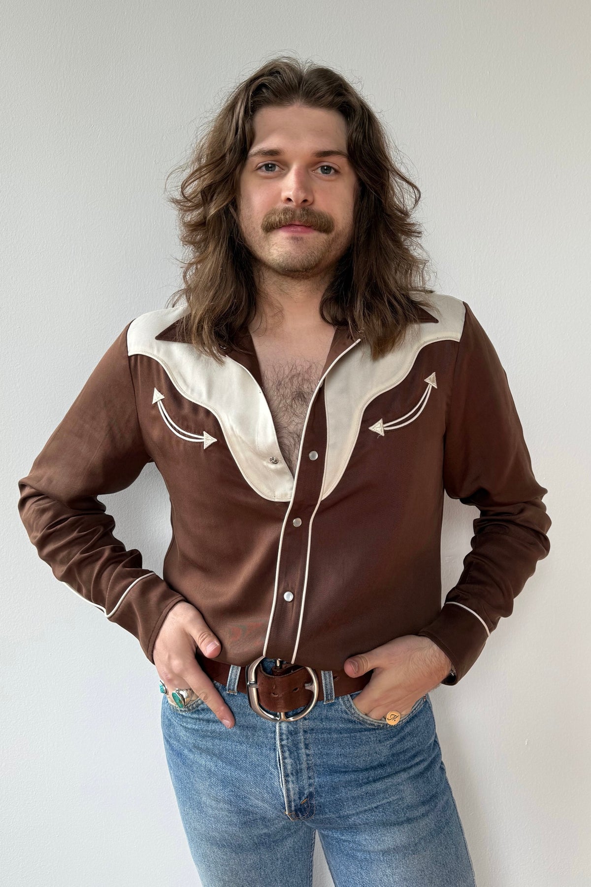 Front view of the H Bar C San Juan chocolate shirt with off-white yoke and piping, worn with jeans.
