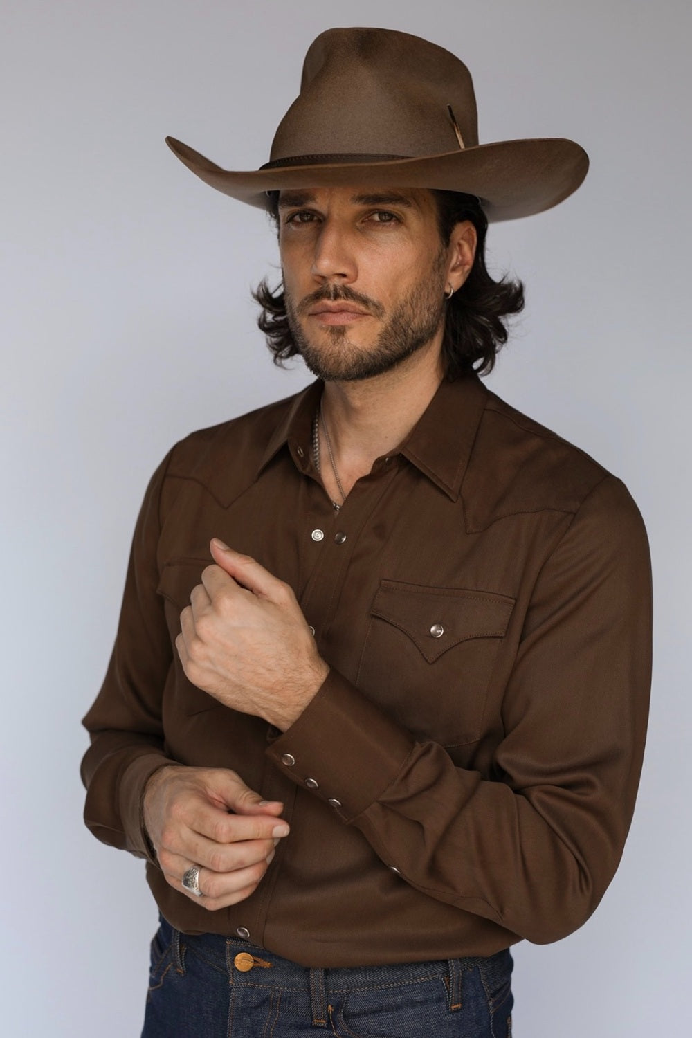 Front view of the H Bar C Denver chocolate brown western shirt with snap cuffs and pointed pockets.