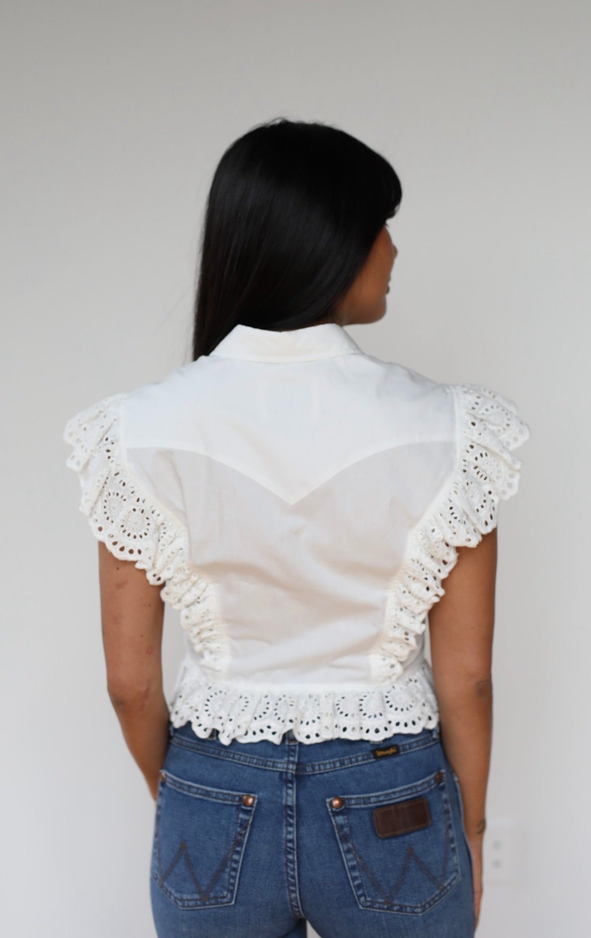 Back of The Lexington H Bar C women's white top showing the western back yoke and lace trim.