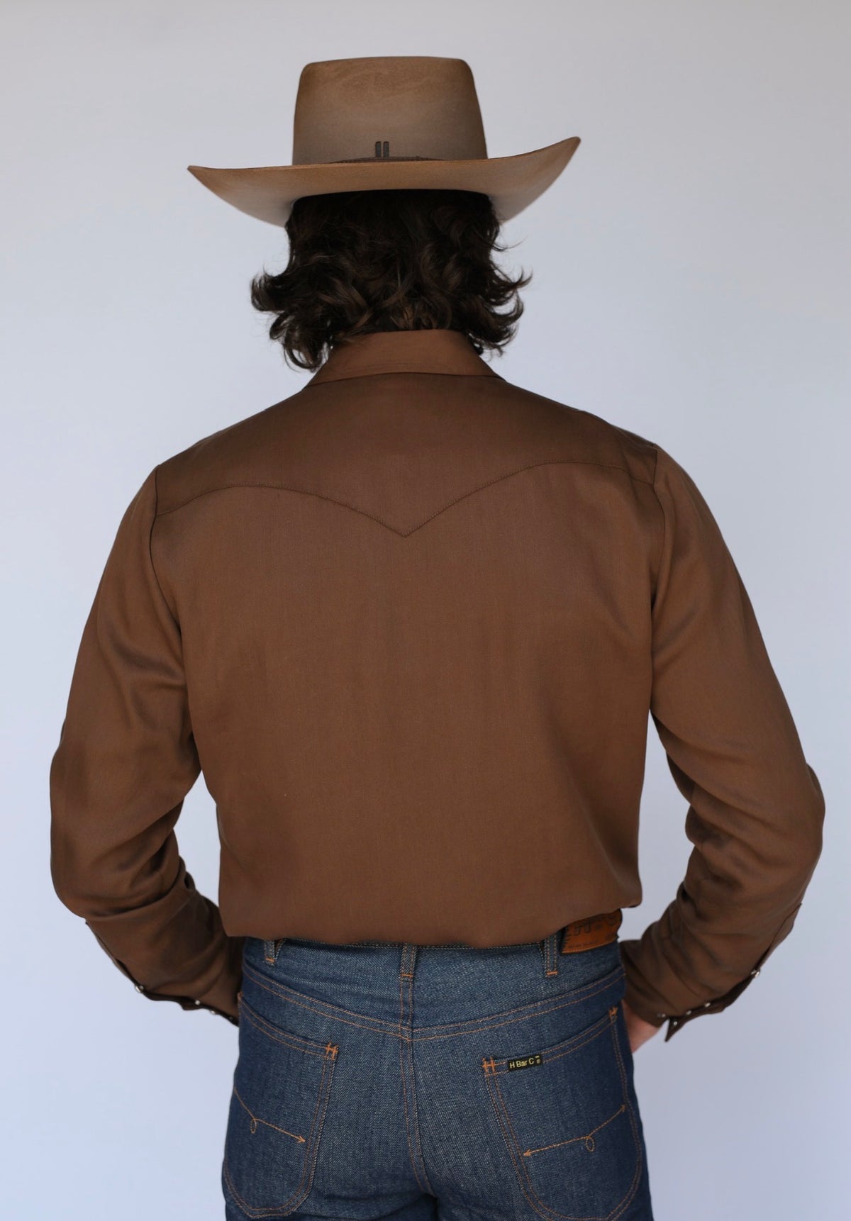 Back view of the H Bar C Denver chocolate brown western shirt with pointed back yoke.