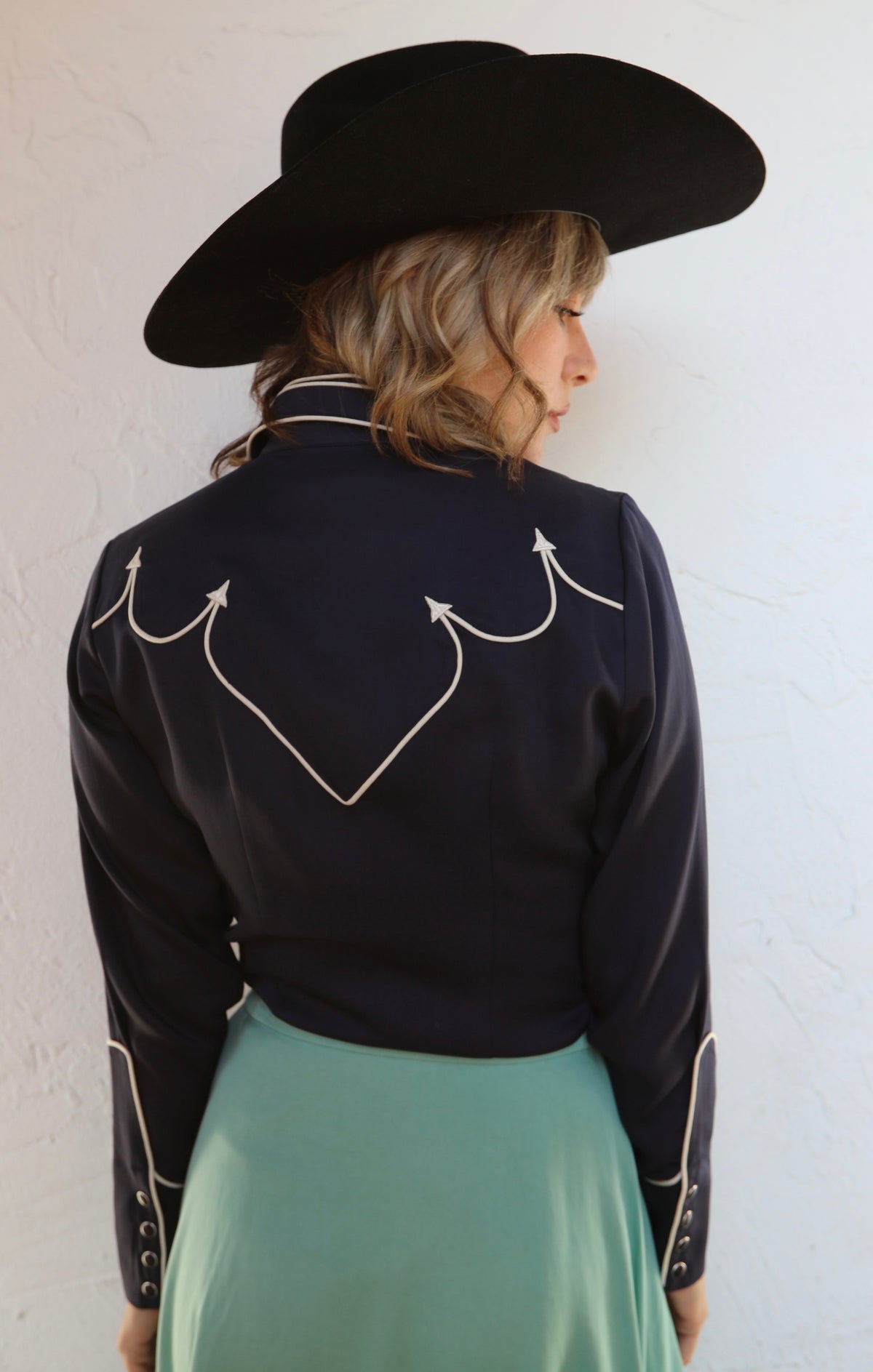 Back view of the H Bar C Lake Tahoe navy women's shirt with scalloped white piped back yoke.