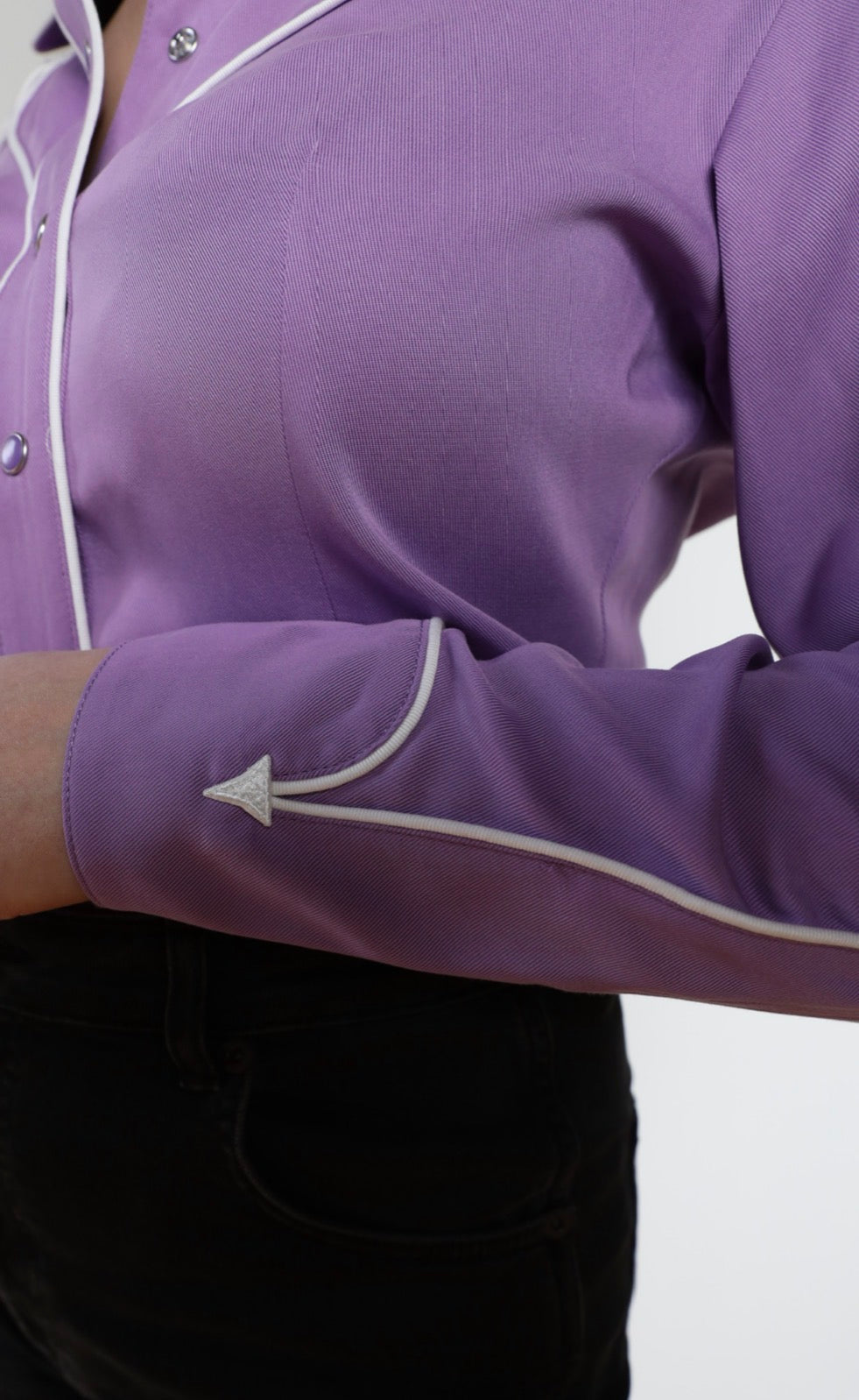 Cuff detail of the H Bar C Lake Tahoe lavender shirt with white piped arrow.