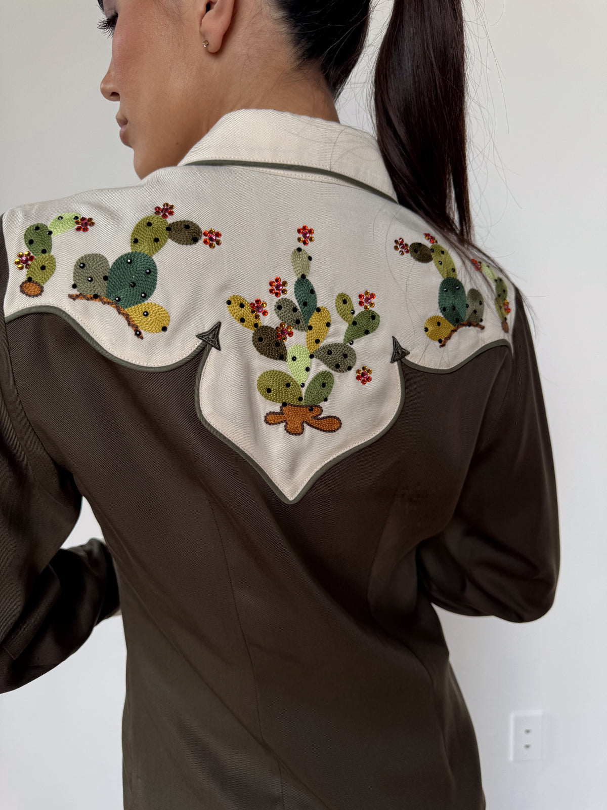 Back yoke detail of the H Bar C San Jose women's shirt with cactus embroidery.