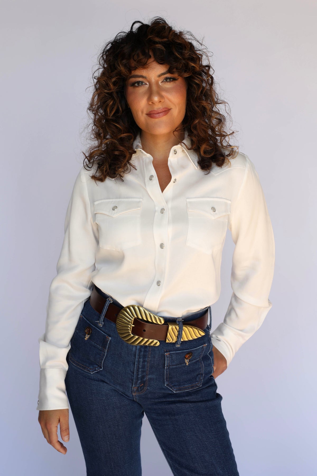 Model in the H Bar C Denver white western shirt for women, a clean everyday vintage inspired western wear staple.