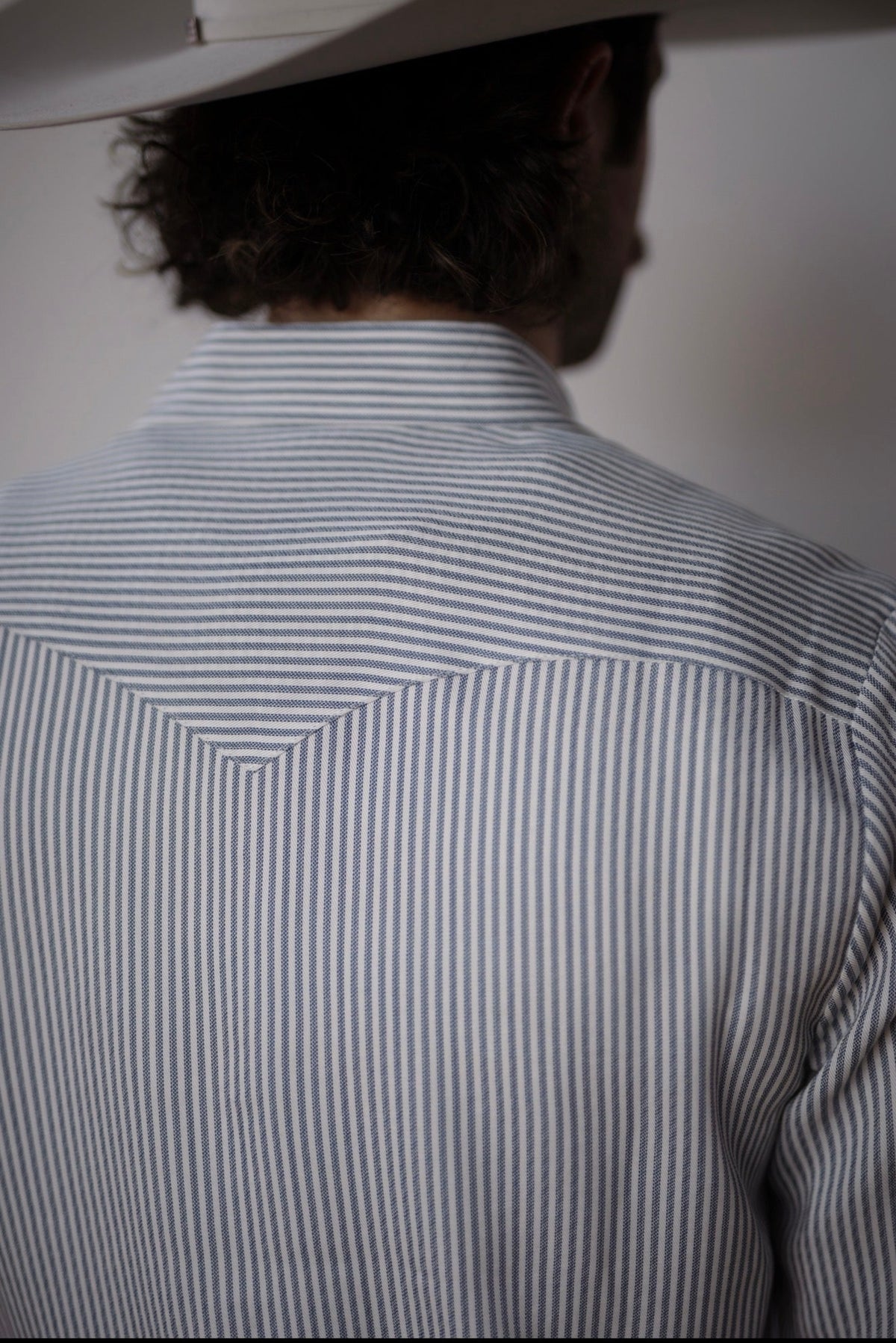 Back yoke detail of the H Bar C Folsom blue and white pinstripe western shirt.