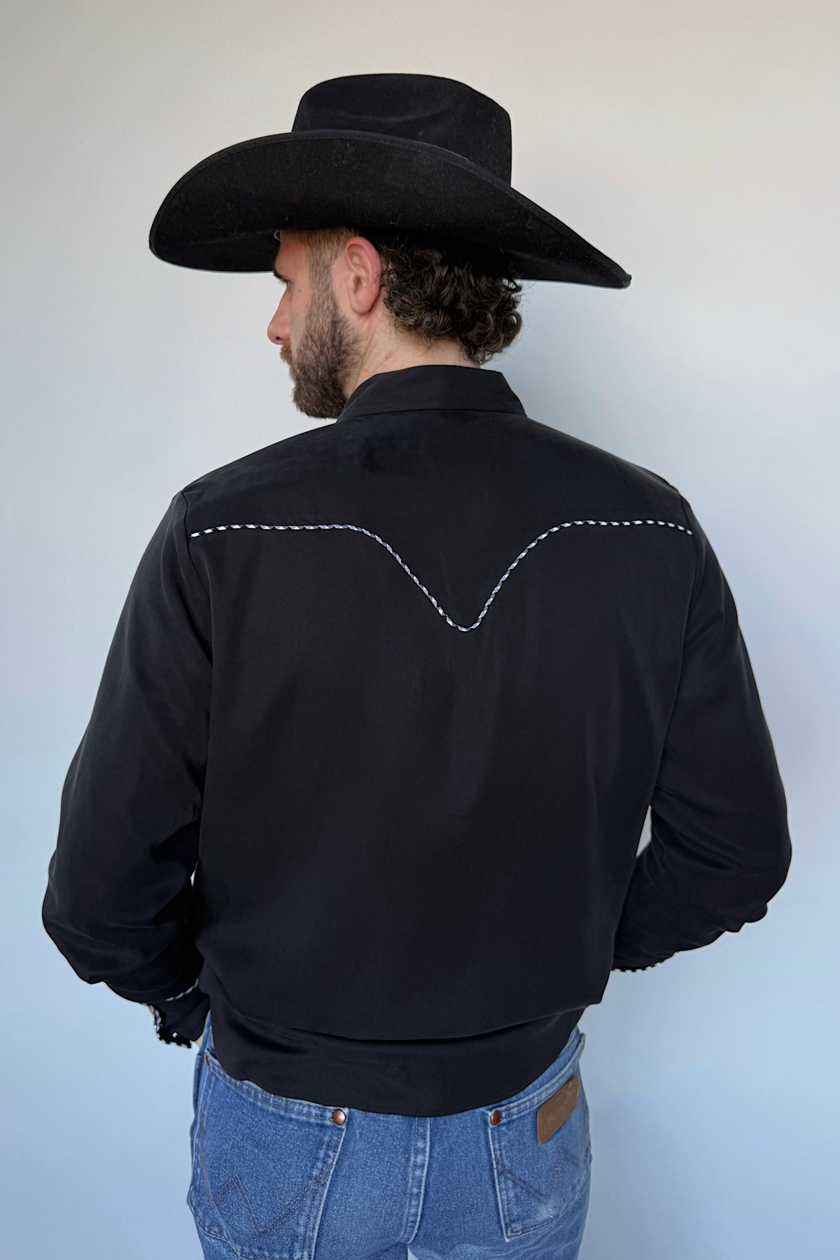 Back view of the H Bar C Jillette black western shirt with piped back yoke.