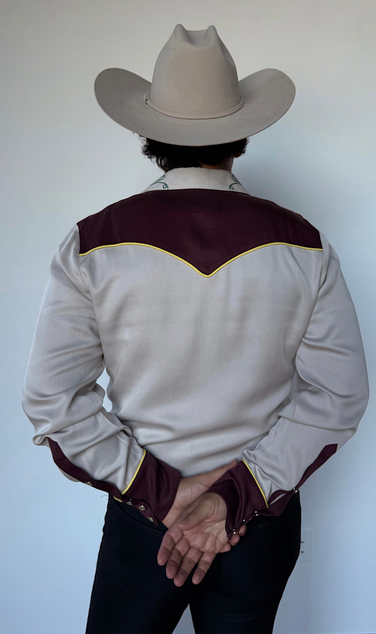 Back view of the H Bar C Cowboy Bob cream western shirt with maroon back yoke.