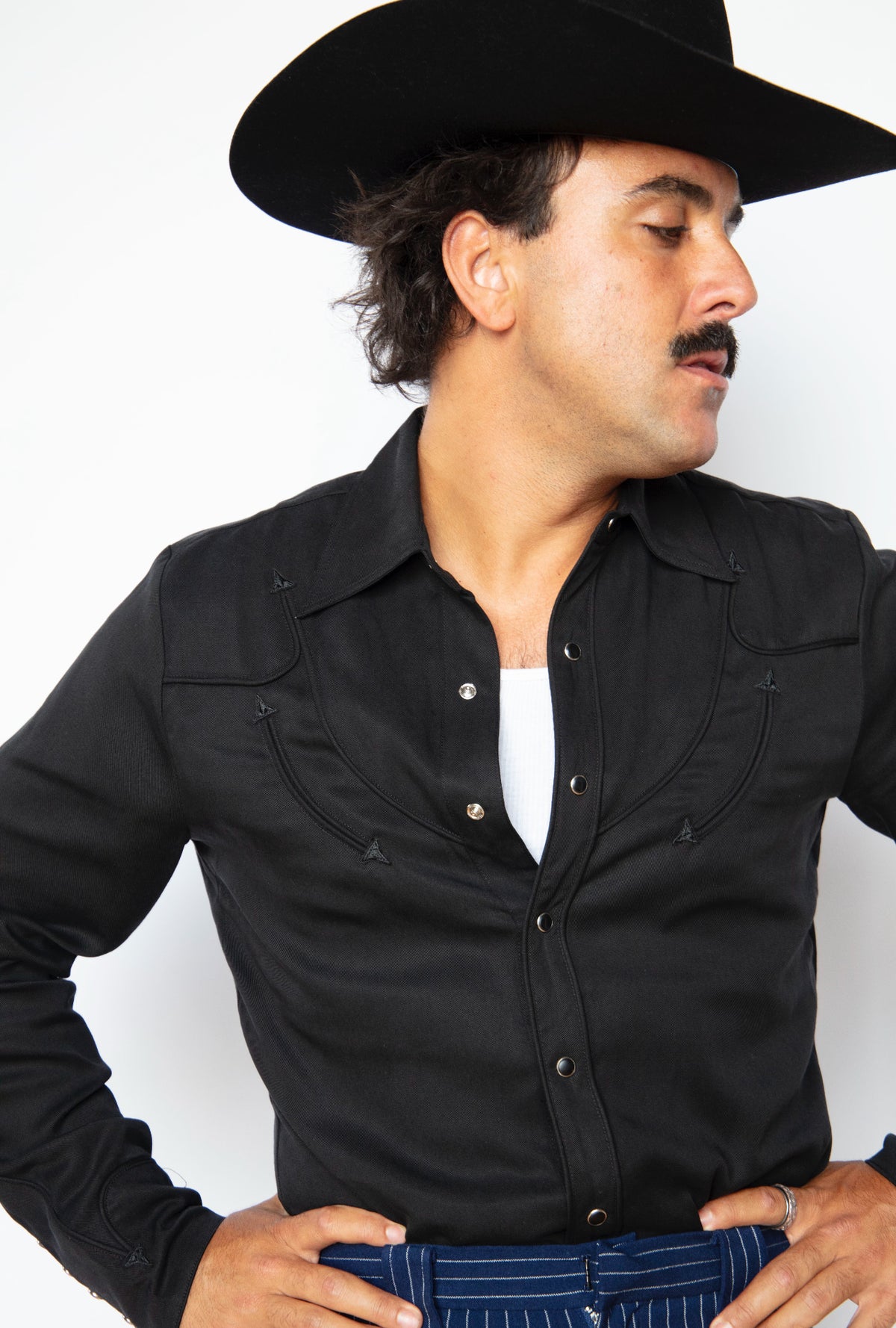Three-quarter view of the H Bar C Reno black on black men's western shirt, a Man in Black tribute.
