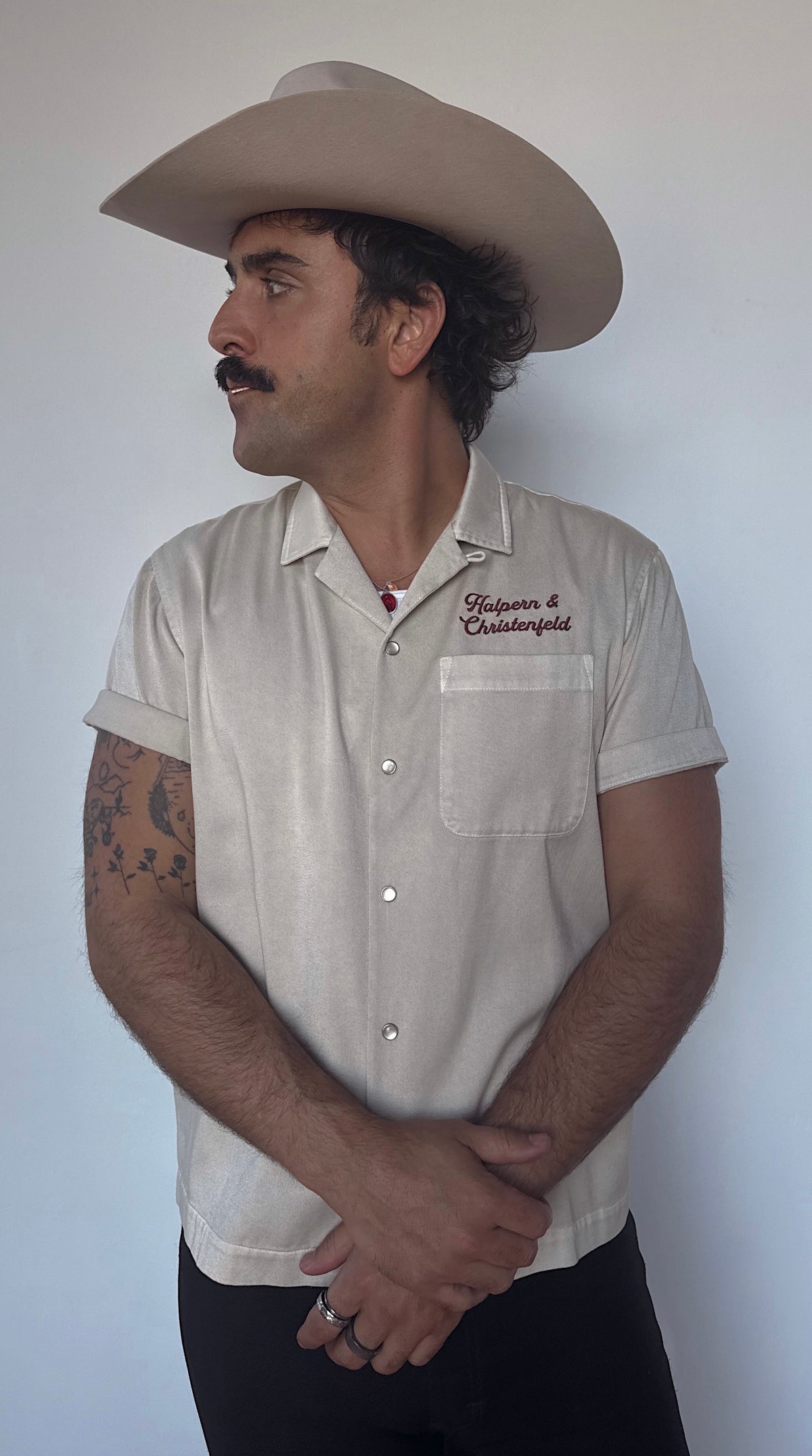 Three-quarter view of the H Bar C Halpern & Christenfeld short sleeve cream bowling shirt.