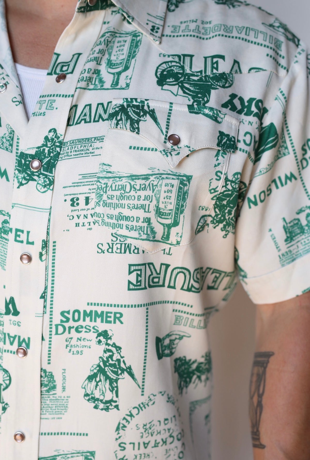 Fabric detail of the green western print on the H Bar C Newport Somerville short sleeve shirt.