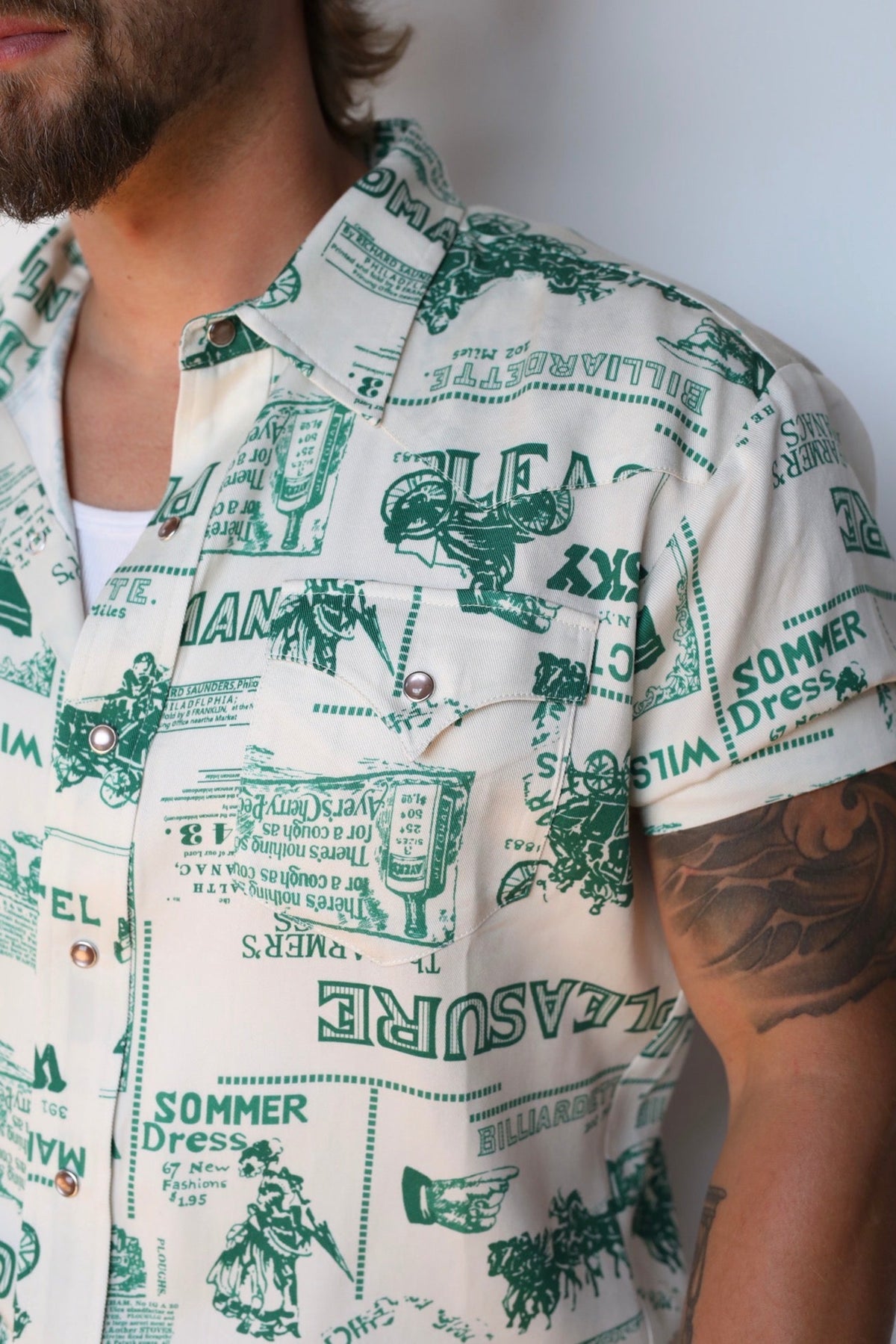 Close-up of the green and cream vintage rodeo print on the H Bar C Newport Somerville shirt.