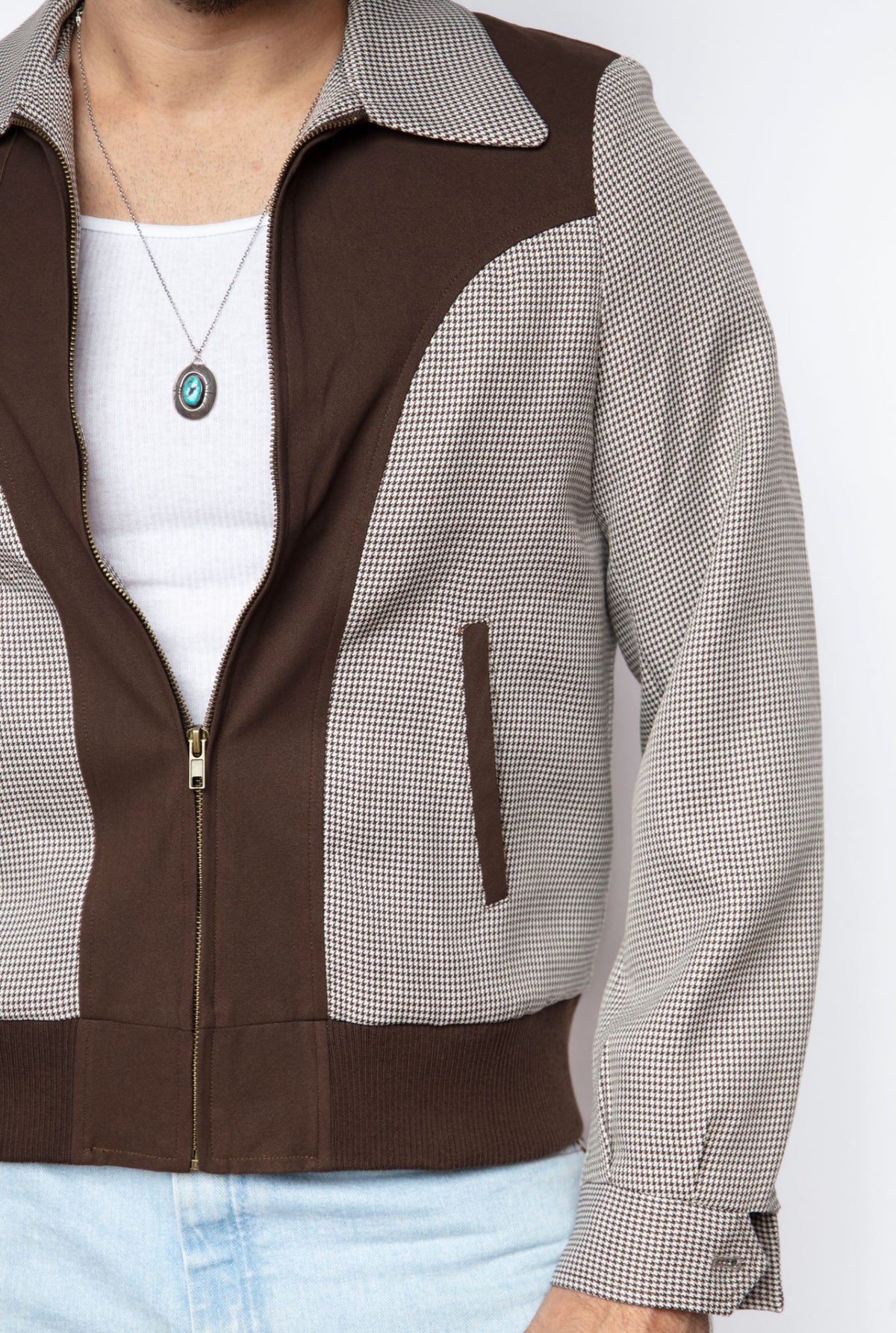 Close-up of the zip front and suede panels on the H Bar C Kentucky espresso jacket.