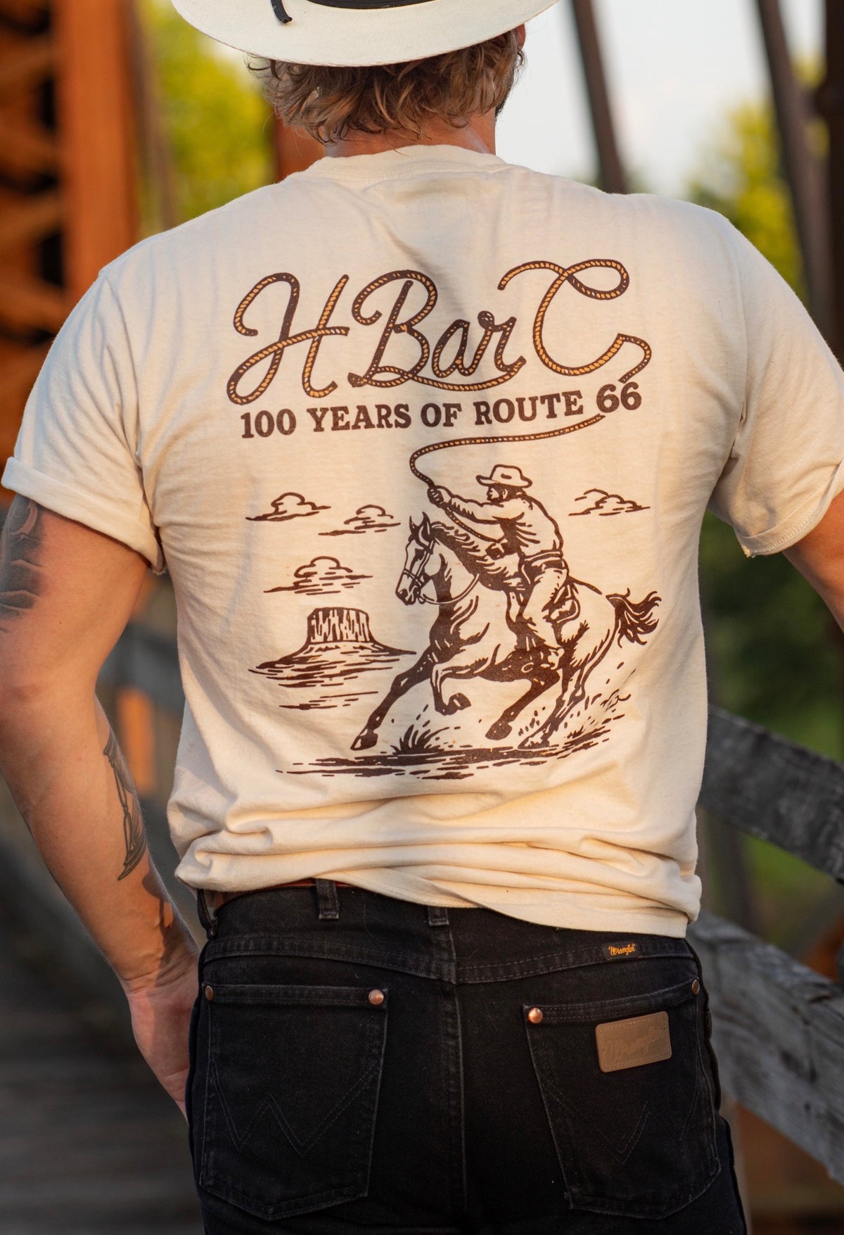 Close-up of the H Bar C 100 Years of Route 66 back print on the cream Tulsa Rope T-shirt.