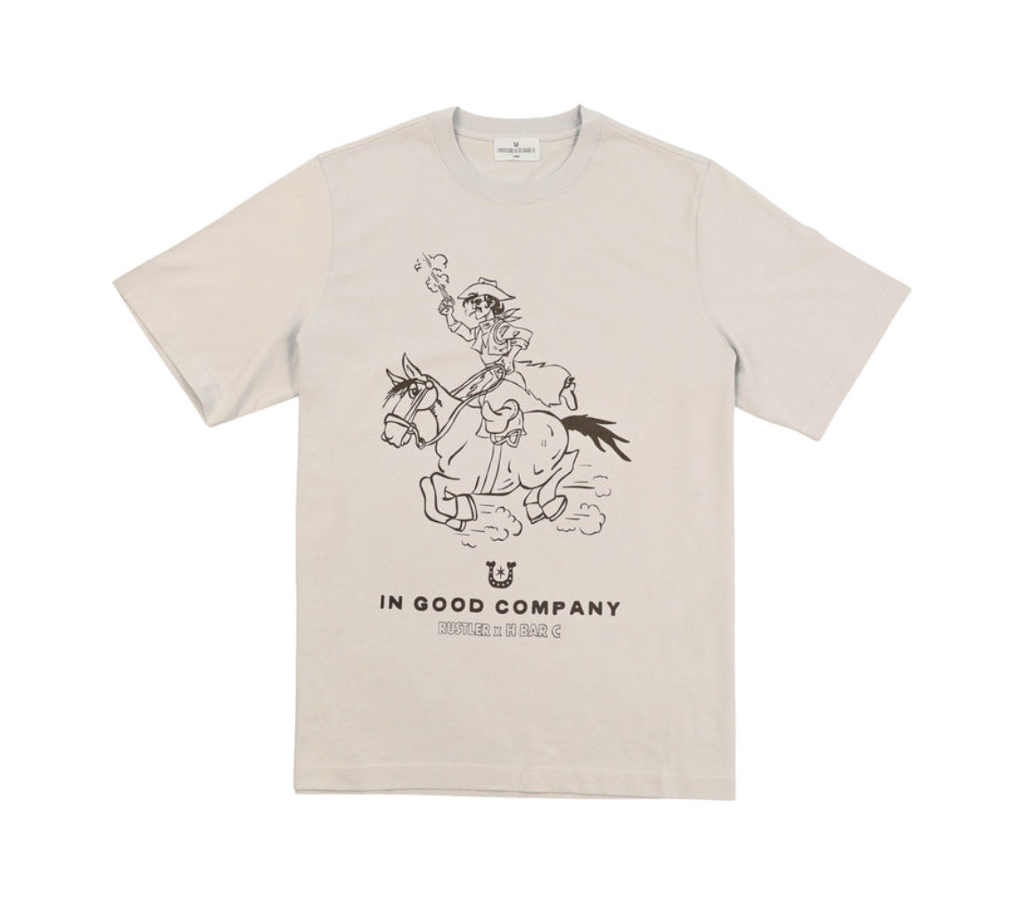 Flat view of the cream H Bar C x Rustler In Good Company men's T-shirt with cowboy graphic.