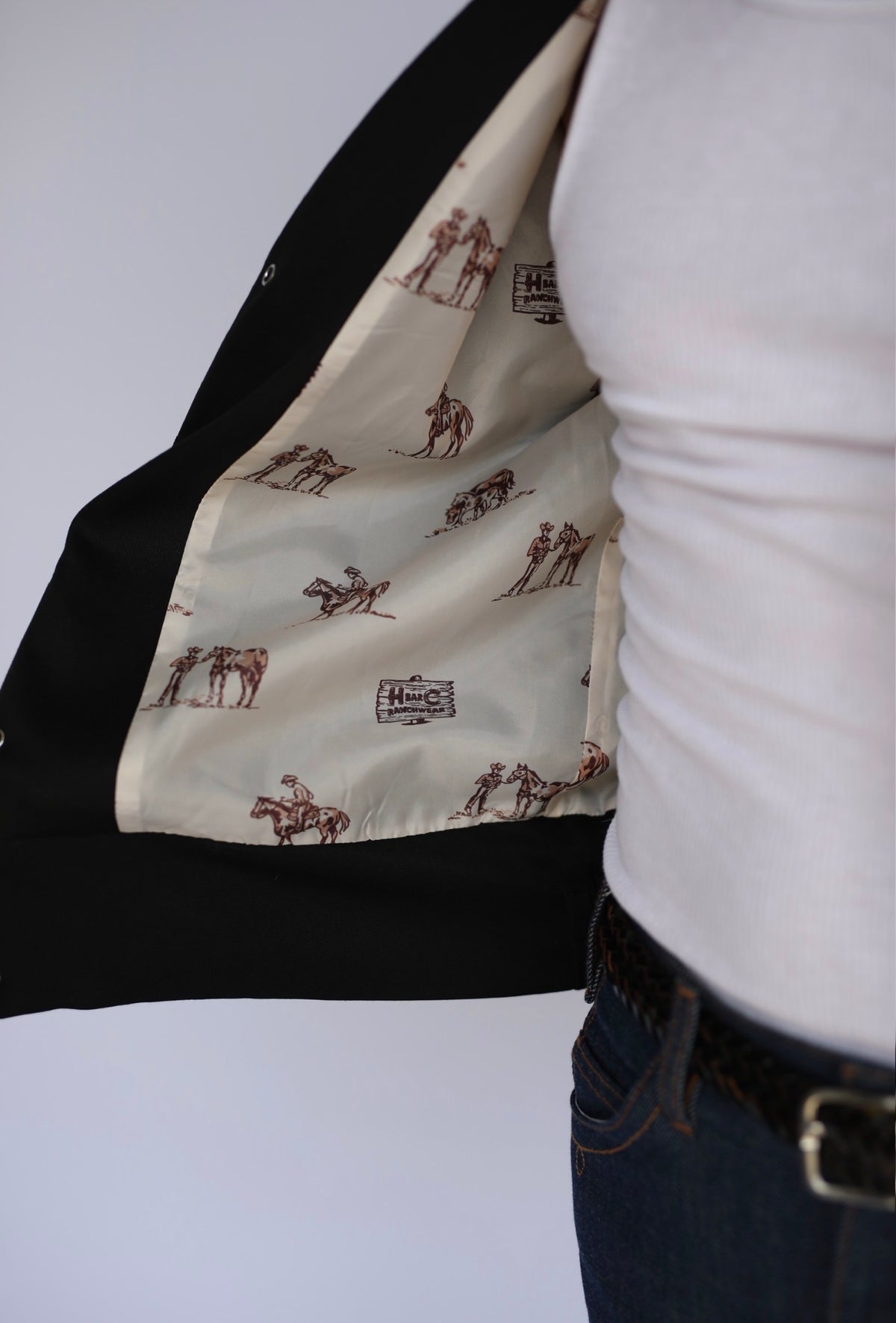 Inside view showing the printed lining of the H Bar C Bolero Nogales black and white jacket.