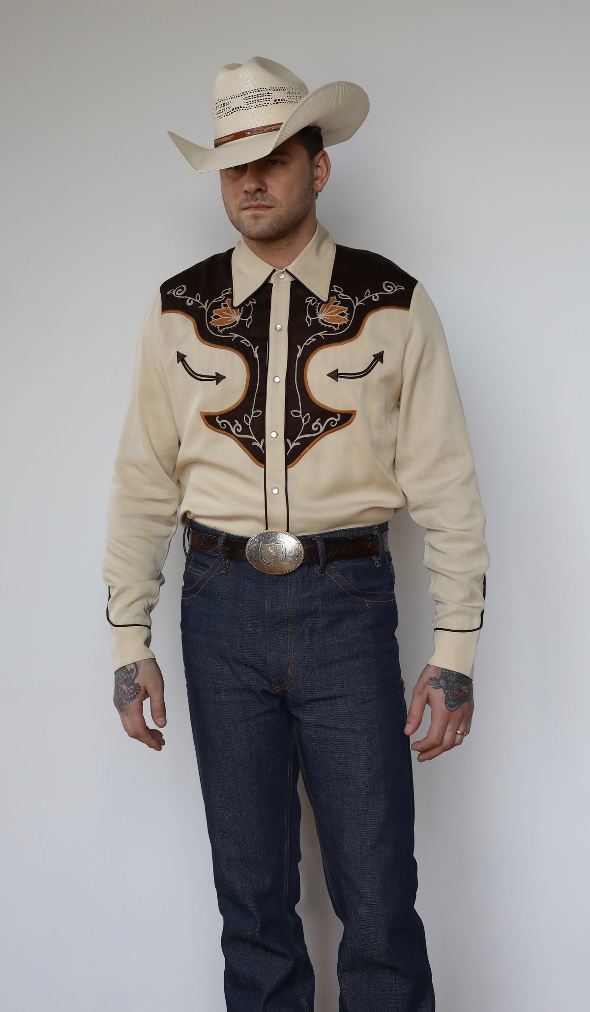 Full length view of the H Bar C Santa Barbara men's western shirt tucked into dark jeans with a cowboy hat.