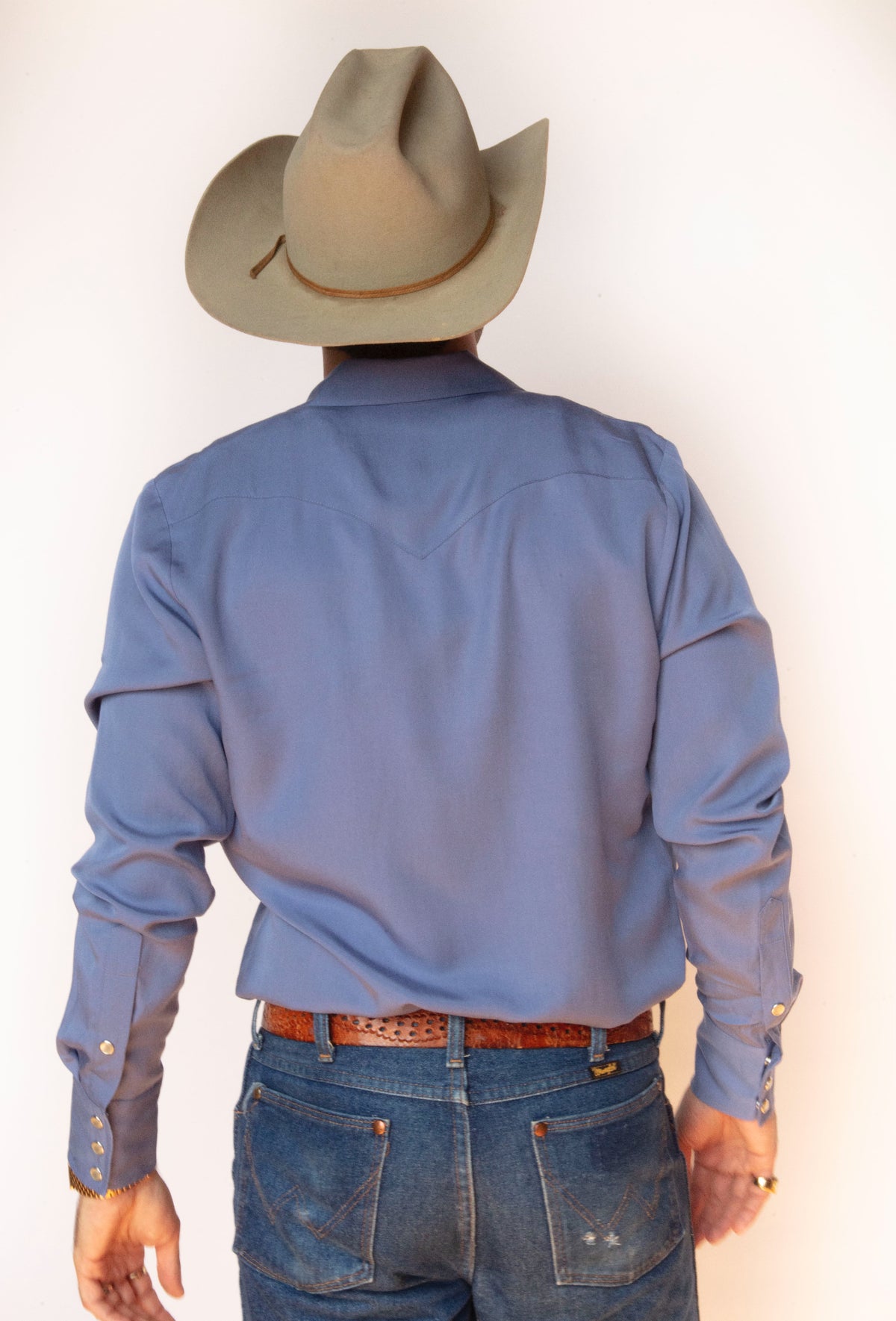 Back view of the H Bar C Denver periwinkle western shirt with pointed back yoke.