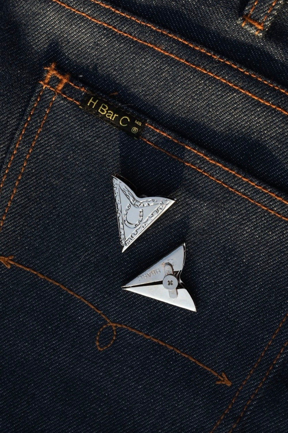 H Bar C engraved western collar tips on raw denim, Five Pieces of the Frontier collection.