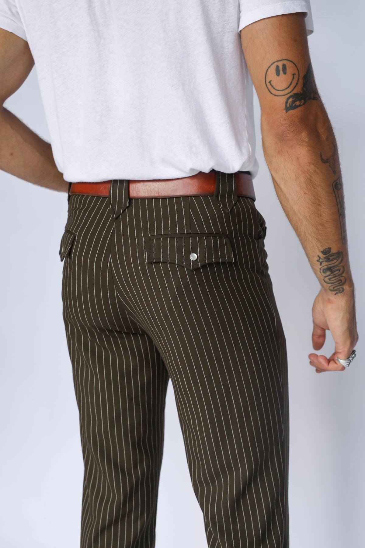 Back pocket close-up of the H Bar C Bakersfield brown pin stripe western pants.
