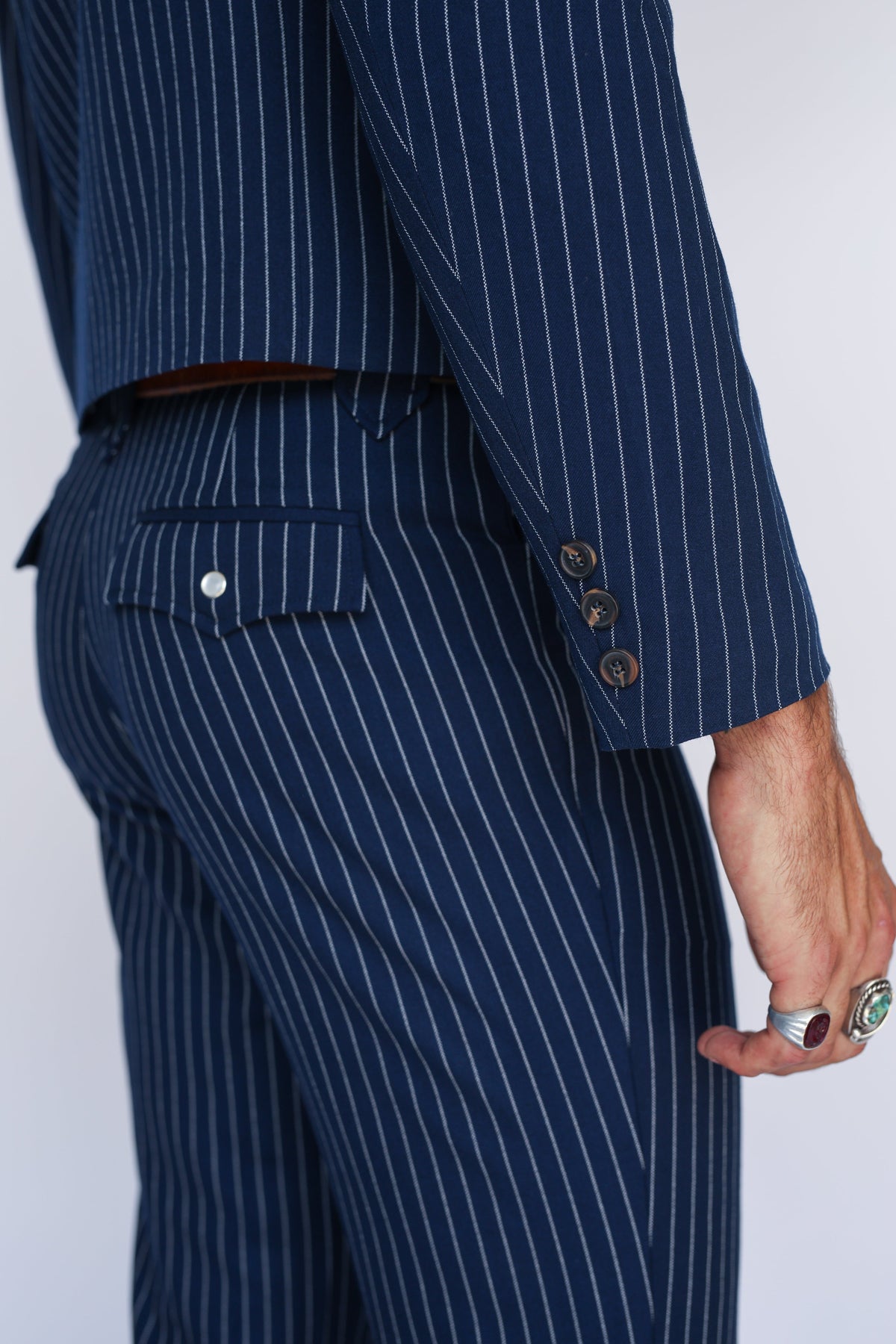 Back pocket and jacket hem detail of the H Bar C Bakersfield navy pinstripe suit.