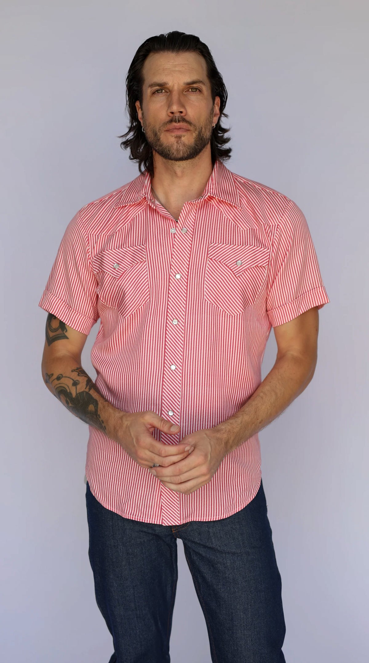 Front view of the H Bar C Newport red striped short sleeve snap shirt.