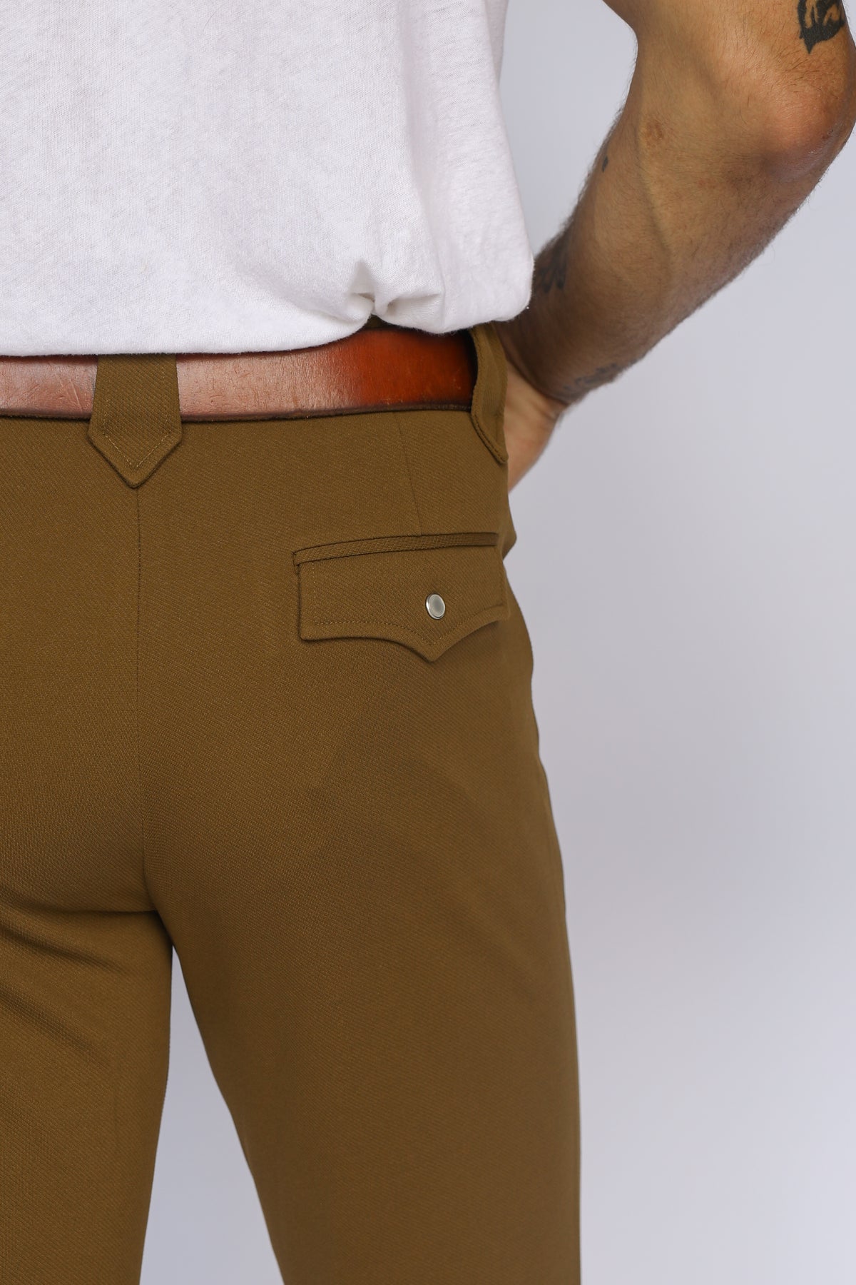 Close-up of the flap back pocket on the H Bar C Franklin olive green western pants.