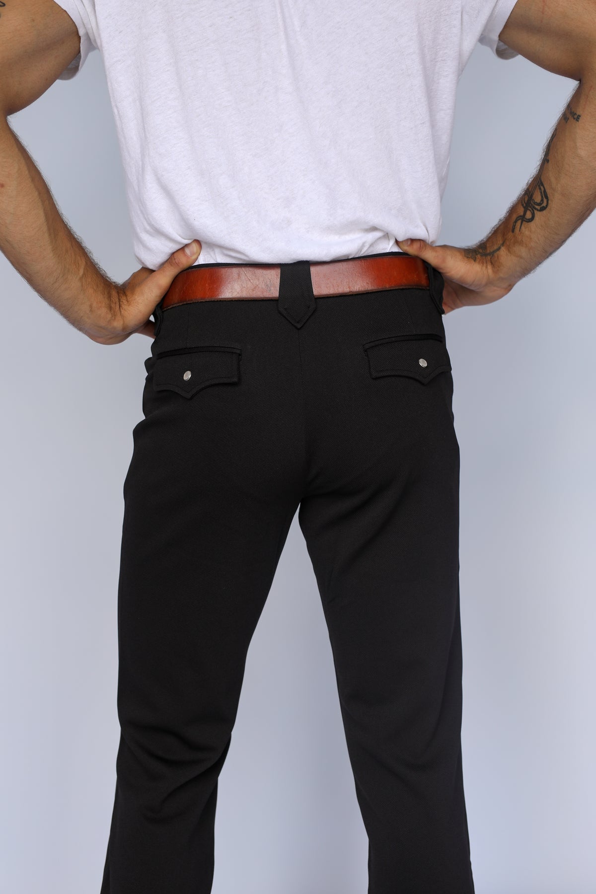 Close-up of the back pockets and seat of the H Bar C Franklin unisex black stretch western pants.