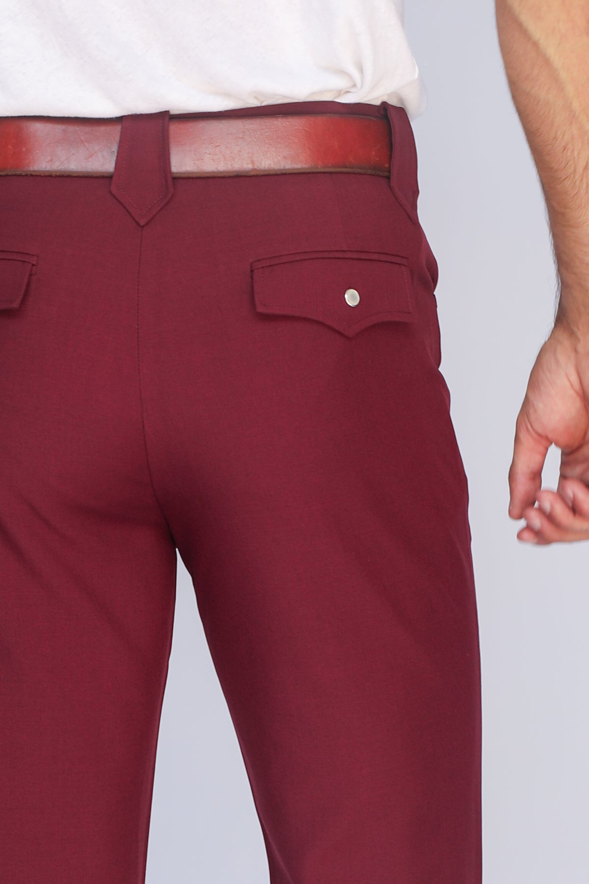 Close-up of the flap back pocket on the H Bar C Calamity maroon western pants.