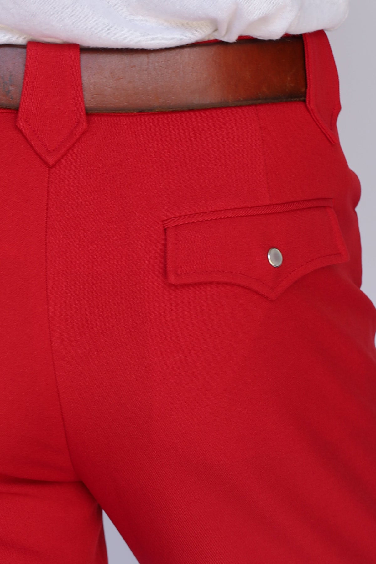 Close-up of the western flap back pocket with snap on the H Bar C Franklin red pants.