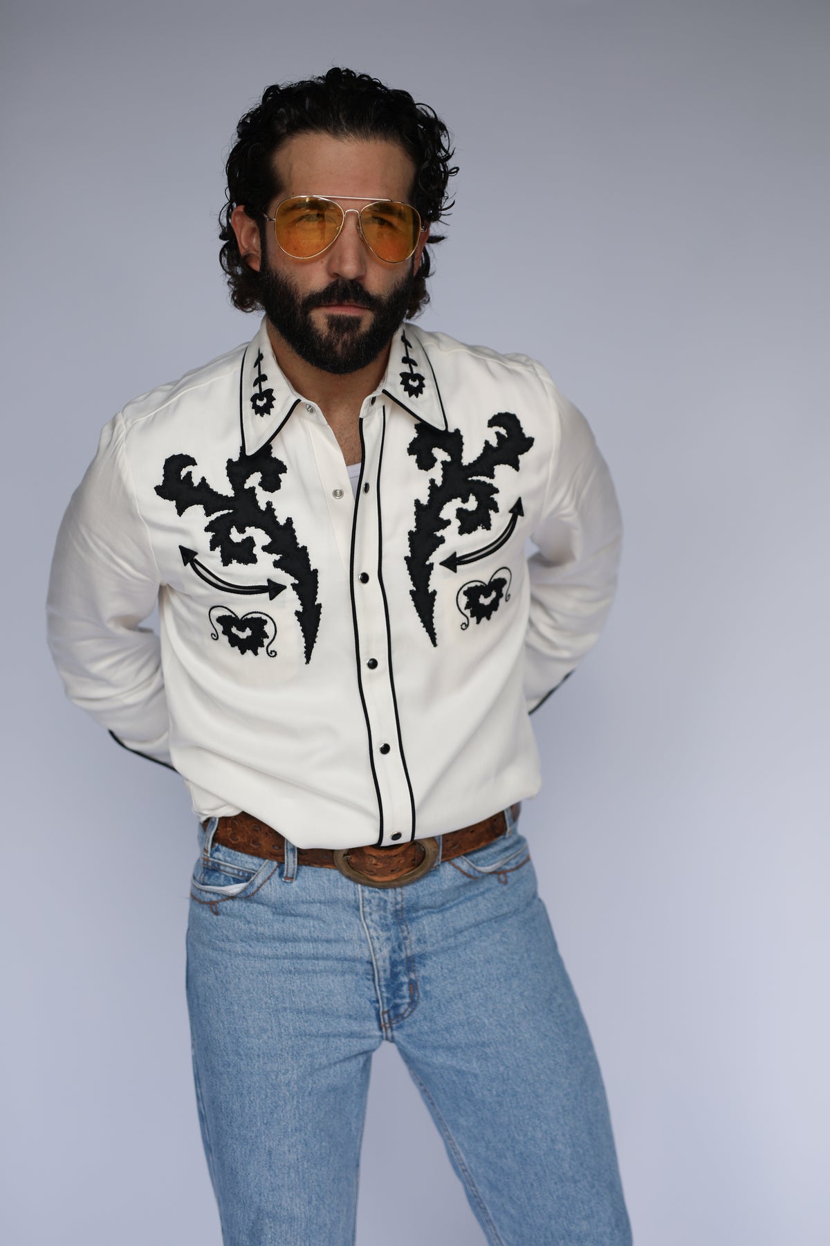 Front view of the H Bar C Dali white western shirt with black embroidered yokes and piping.