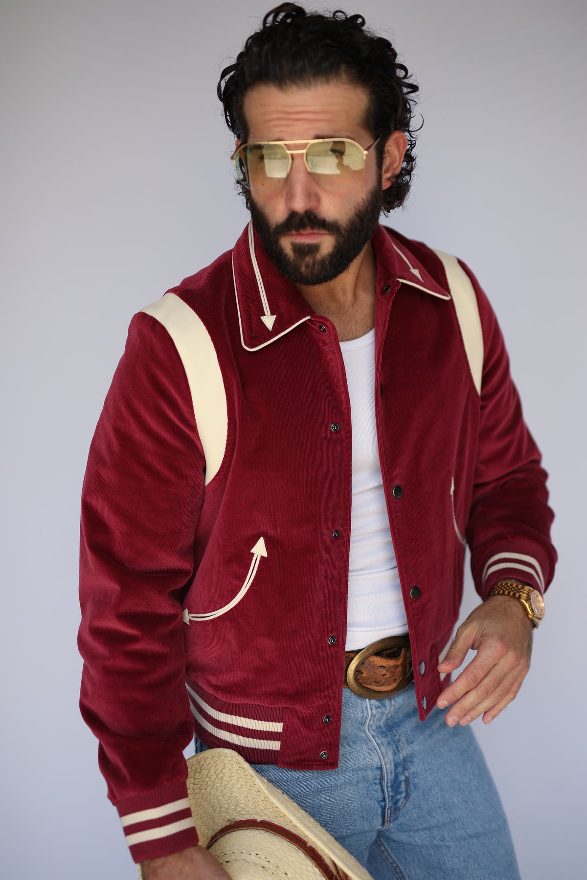 Close-up of the H Bar C Silver Lake maroon corduroy jacket with cream arrow pockets and shoulder panels.