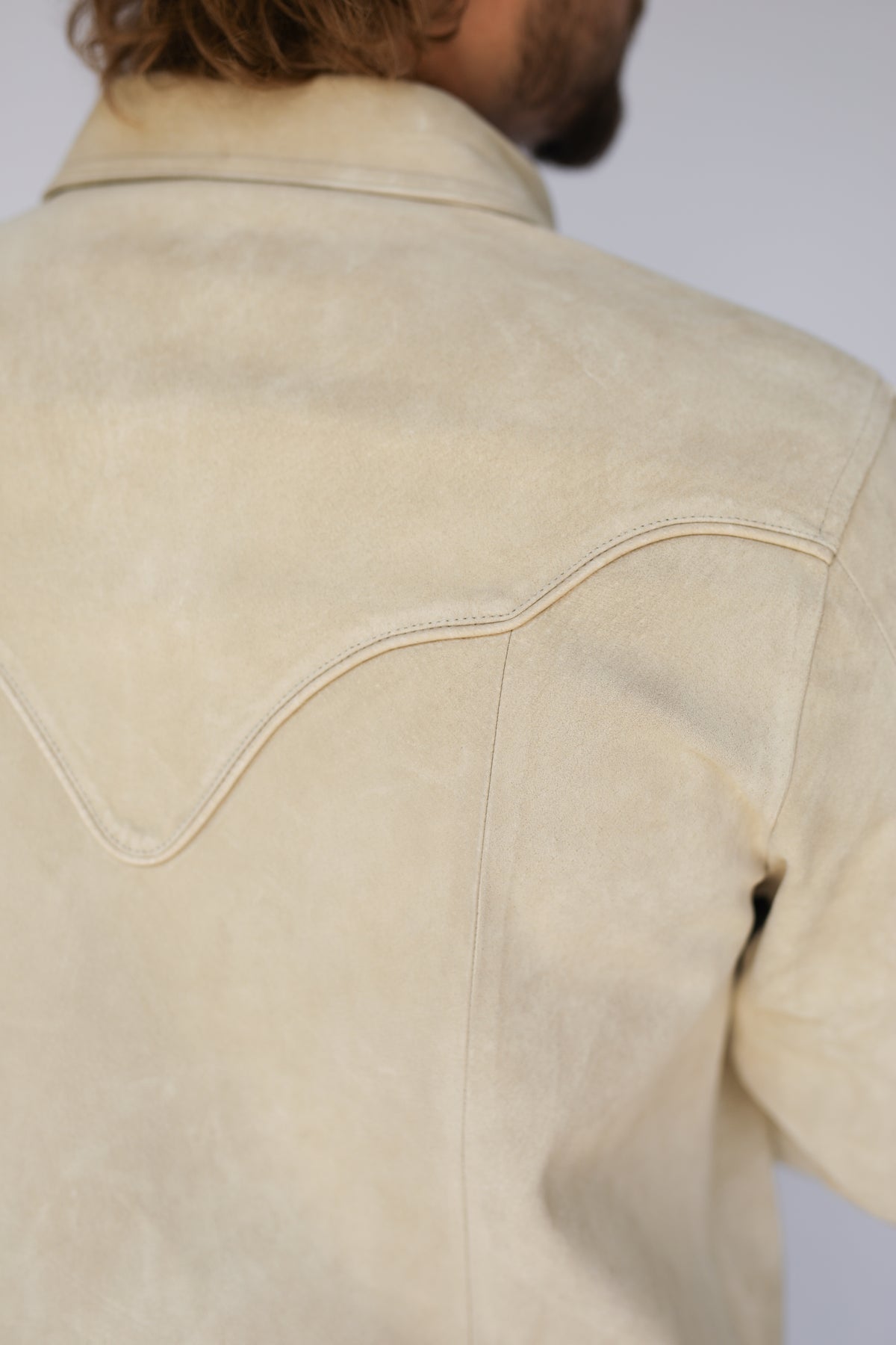 Back yoke detail of the H Bar C Austin premium stone suede jacket.