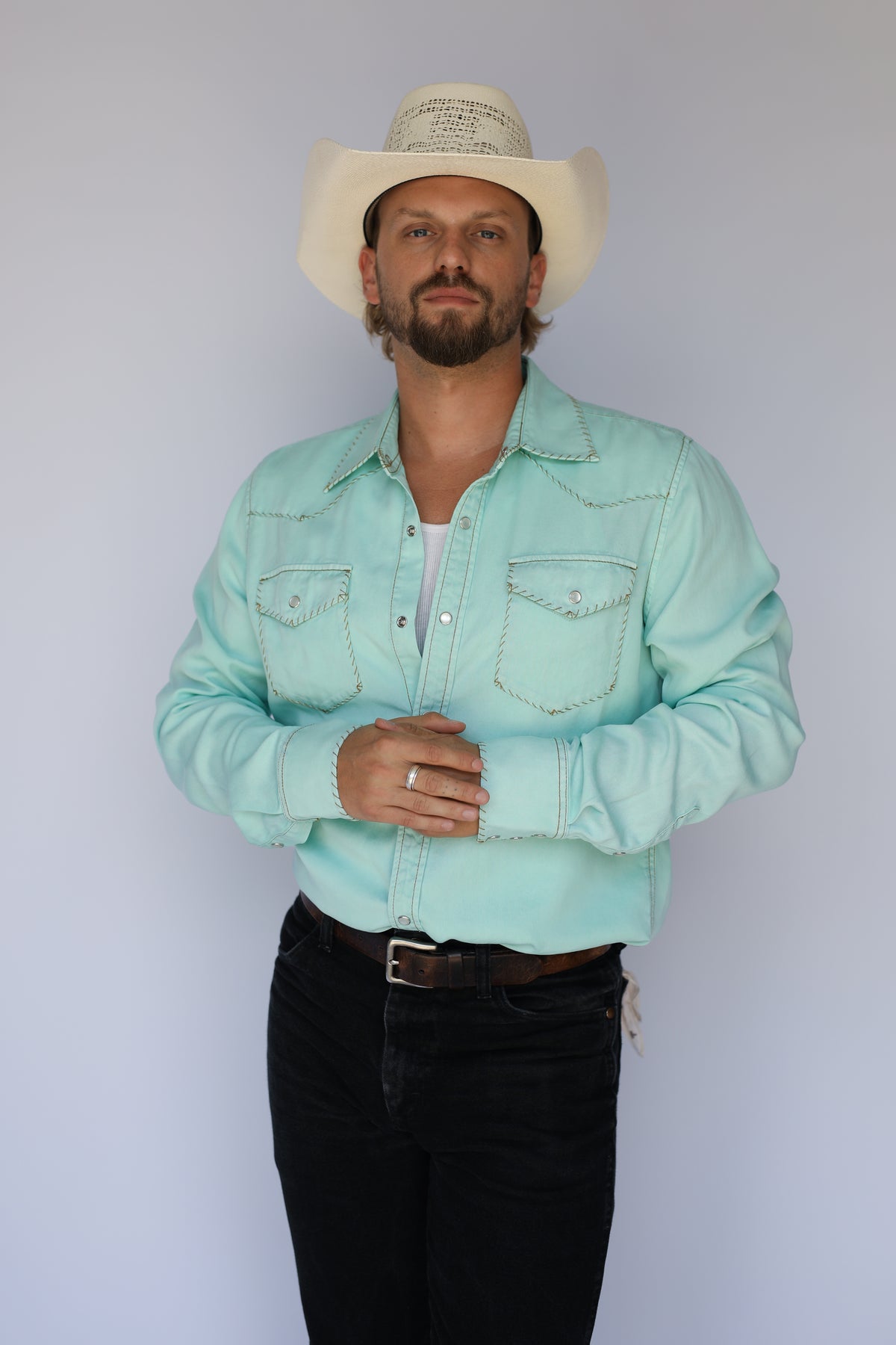 Front view of the H Bar C Brooklyn turquoise western shirt with one point yoke and stitched pockets.