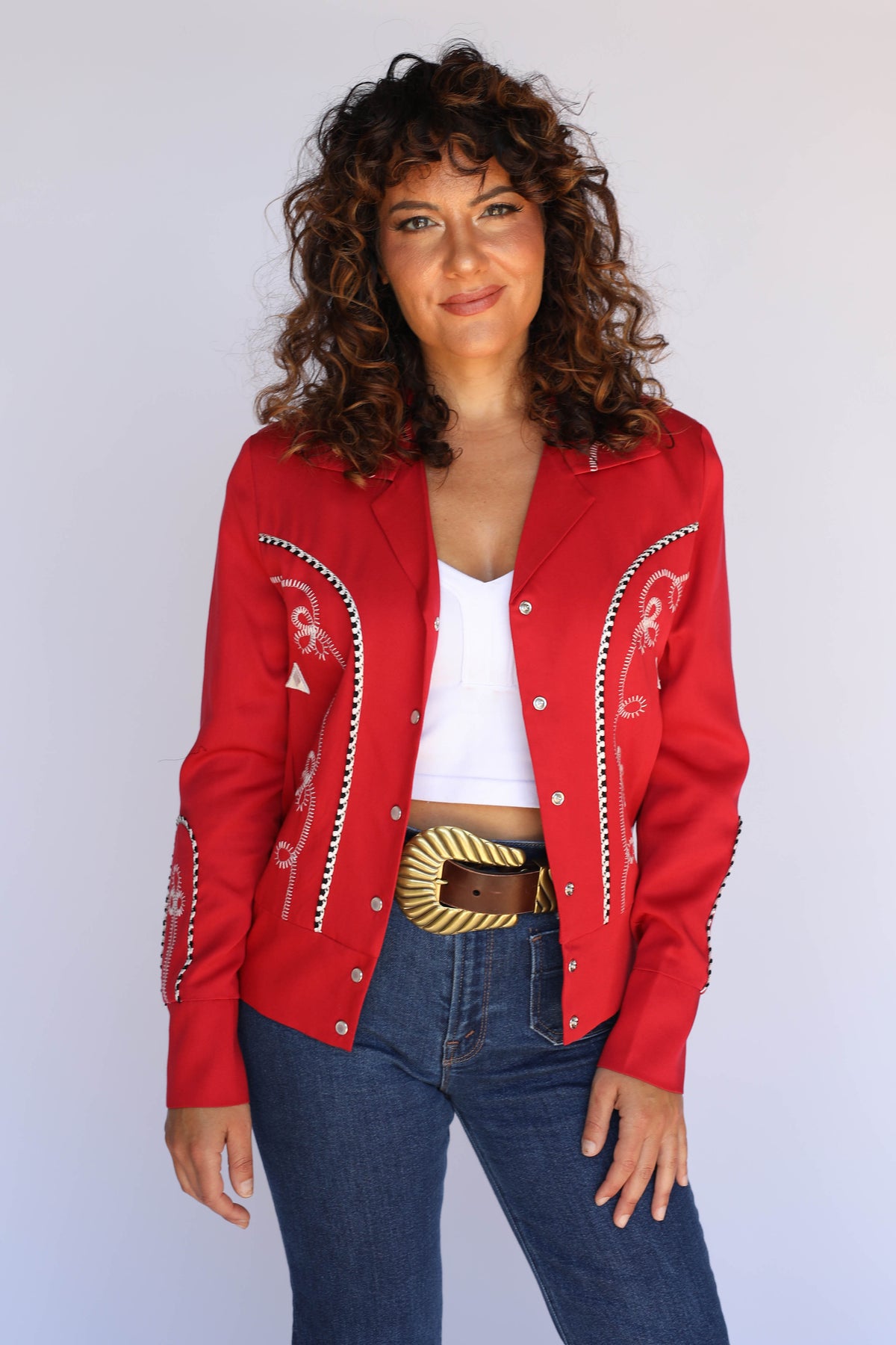 H Bar C Bolero jacket in red styled on a female model, a men's cropped western jacket worn as women's vintage western wear.