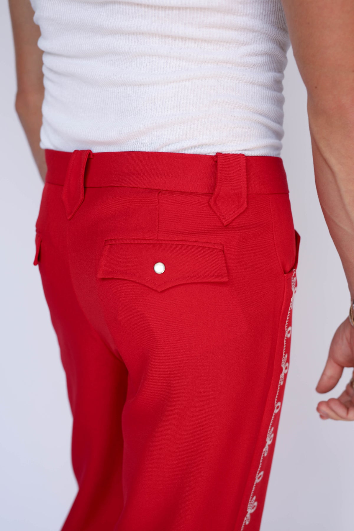 Back view of the H Bar C Bolero red straight leg western pants.