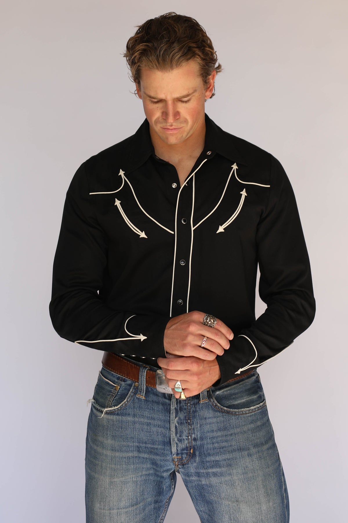Front view of the H Bar C Reno black and off-white shirt with piped long cuffs, vintage inspired western wear.