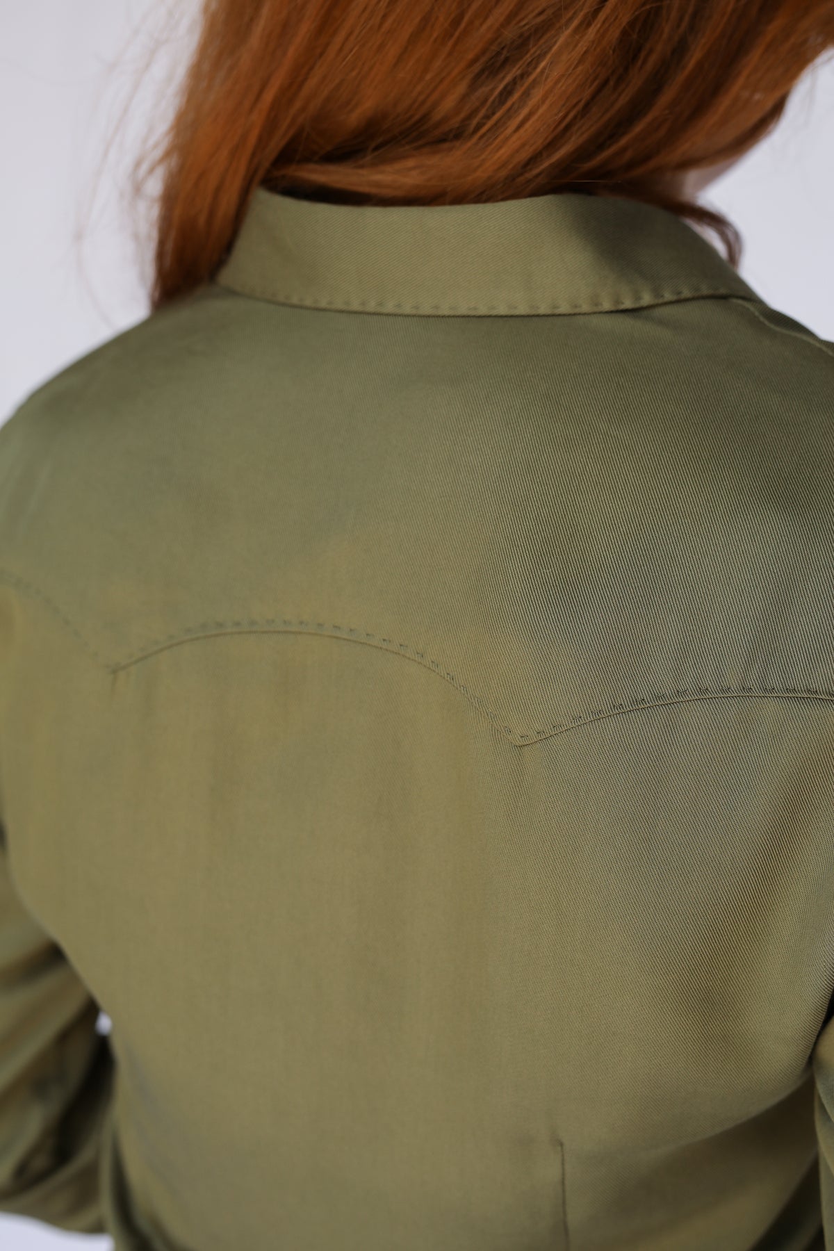 Detail of the back yoke on the H Bar C Savannah olive green dress.