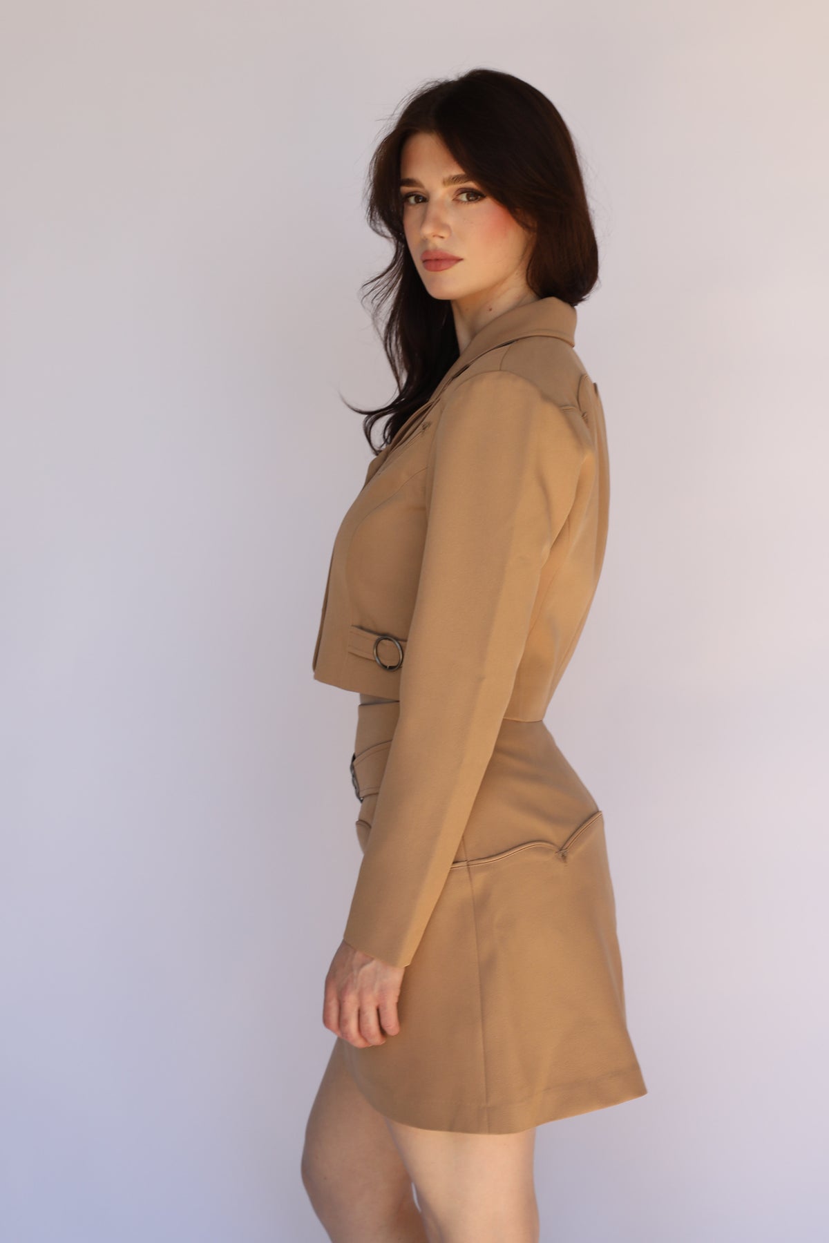Side view of the H Bar C Raleigh tan jacket and skirt set, vintage western wear for women.
