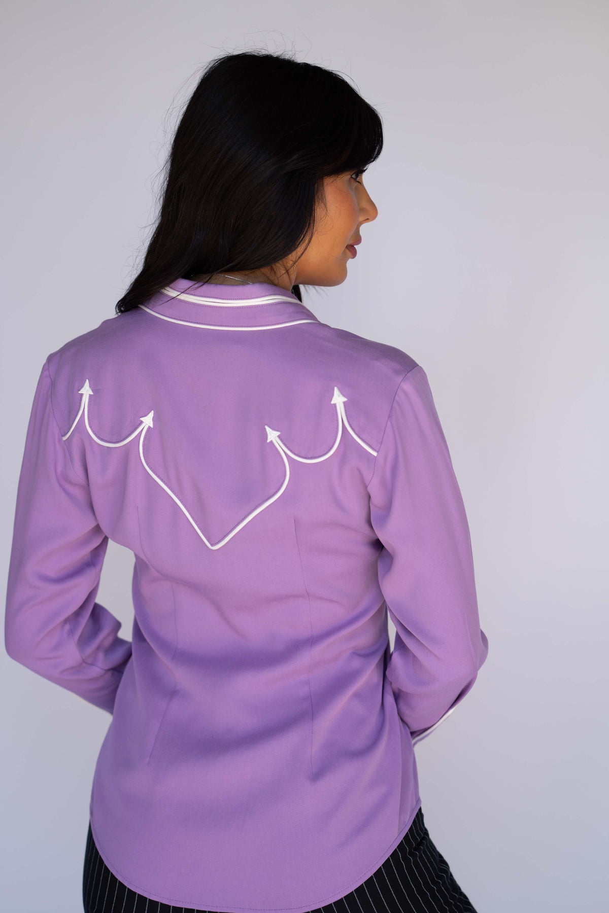 Back view of the H Bar C Lake Tahoe lavender shirt with white piped scalloped back yoke.