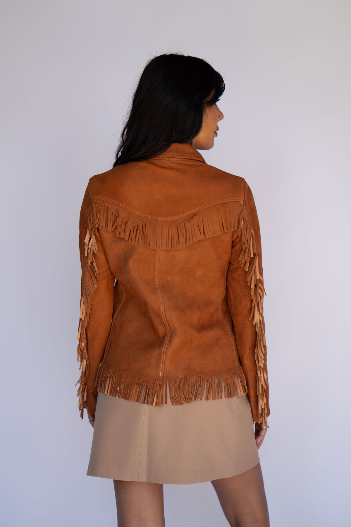 Back view of the H Bar C Omaha women's tan suede fringe western jacket.