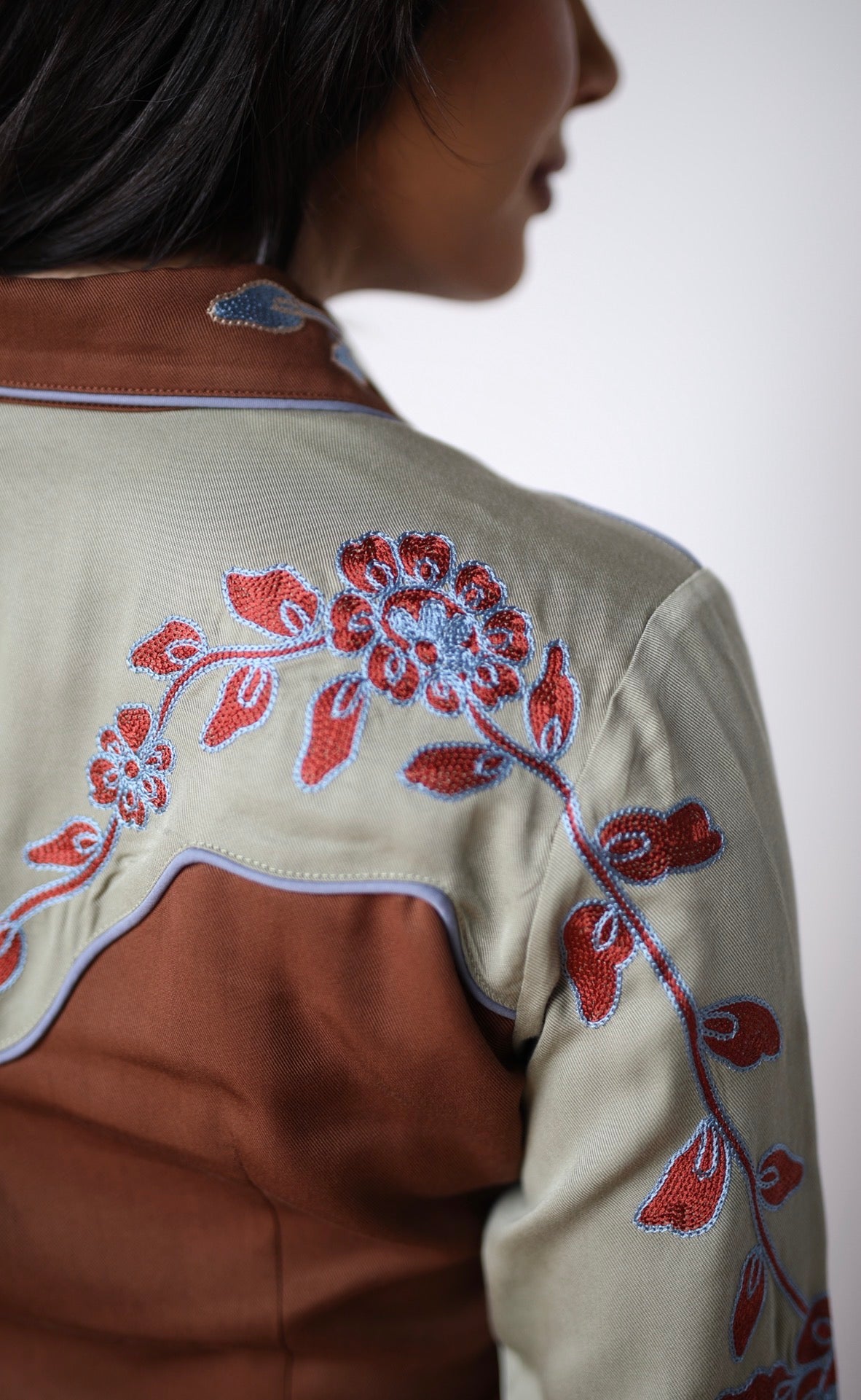 Back shoulder detail of the H Bar C San Antonio brown shirt with embroidered sage yoke.