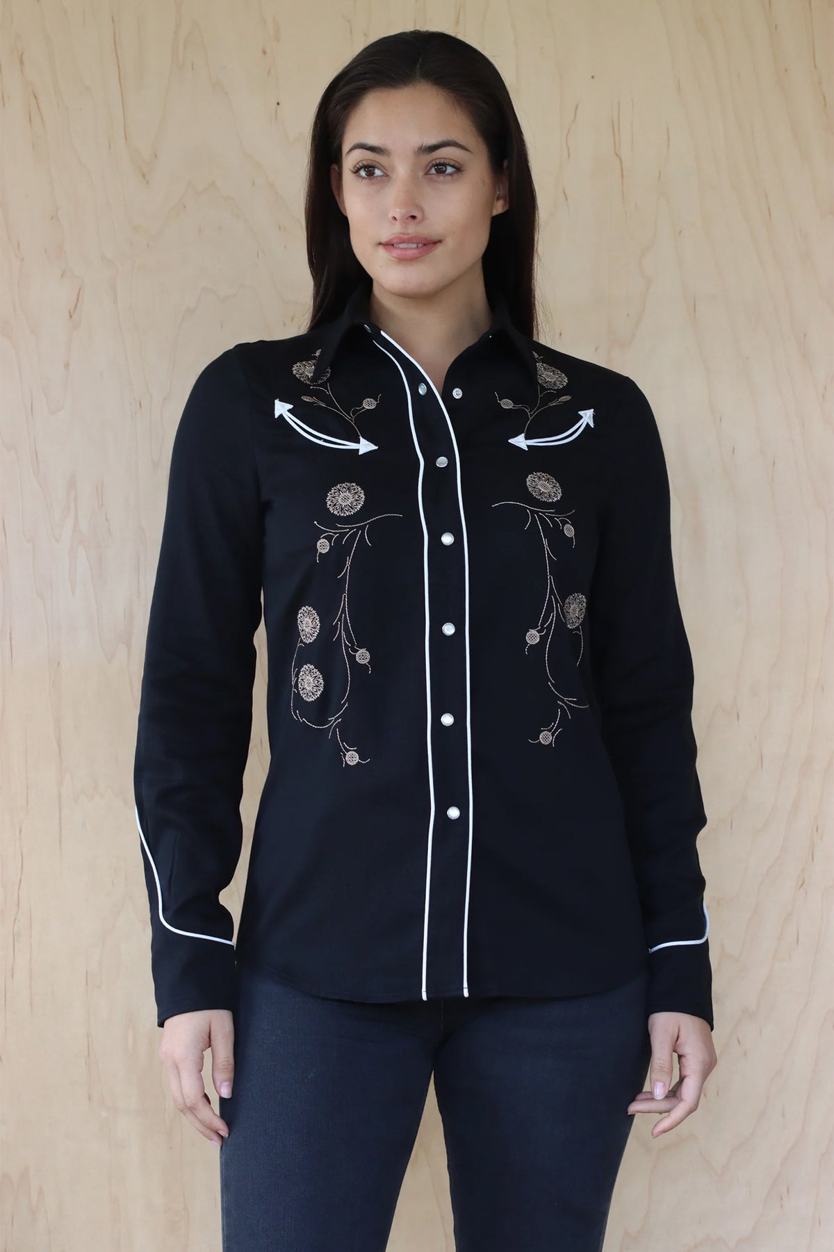 Front view of the HBarC x Gibson J-200 women's black shirt, the San Fernando with J-200 guitar embroidery.