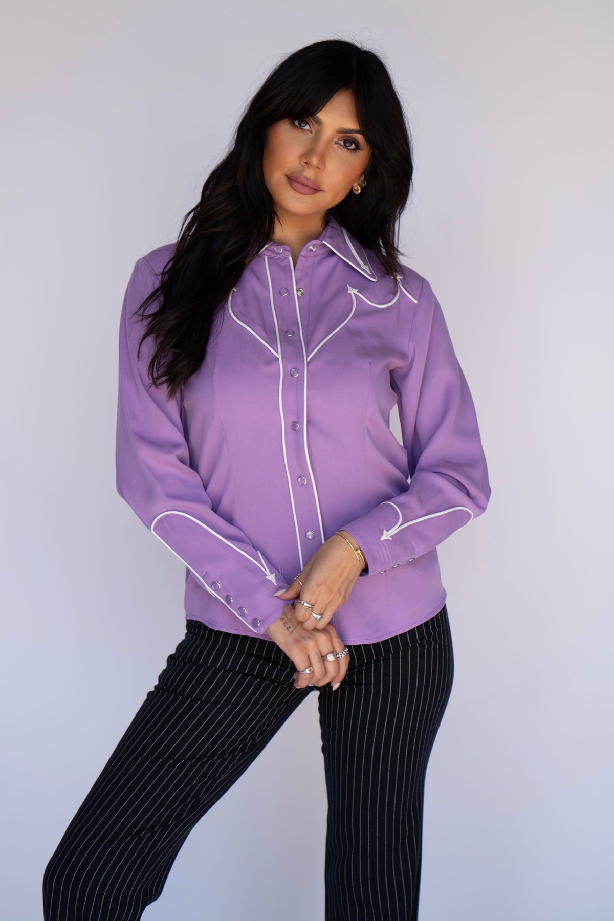 Model in the H Bar C Lake Tahoe lavender western shirt with white contrast piping.
