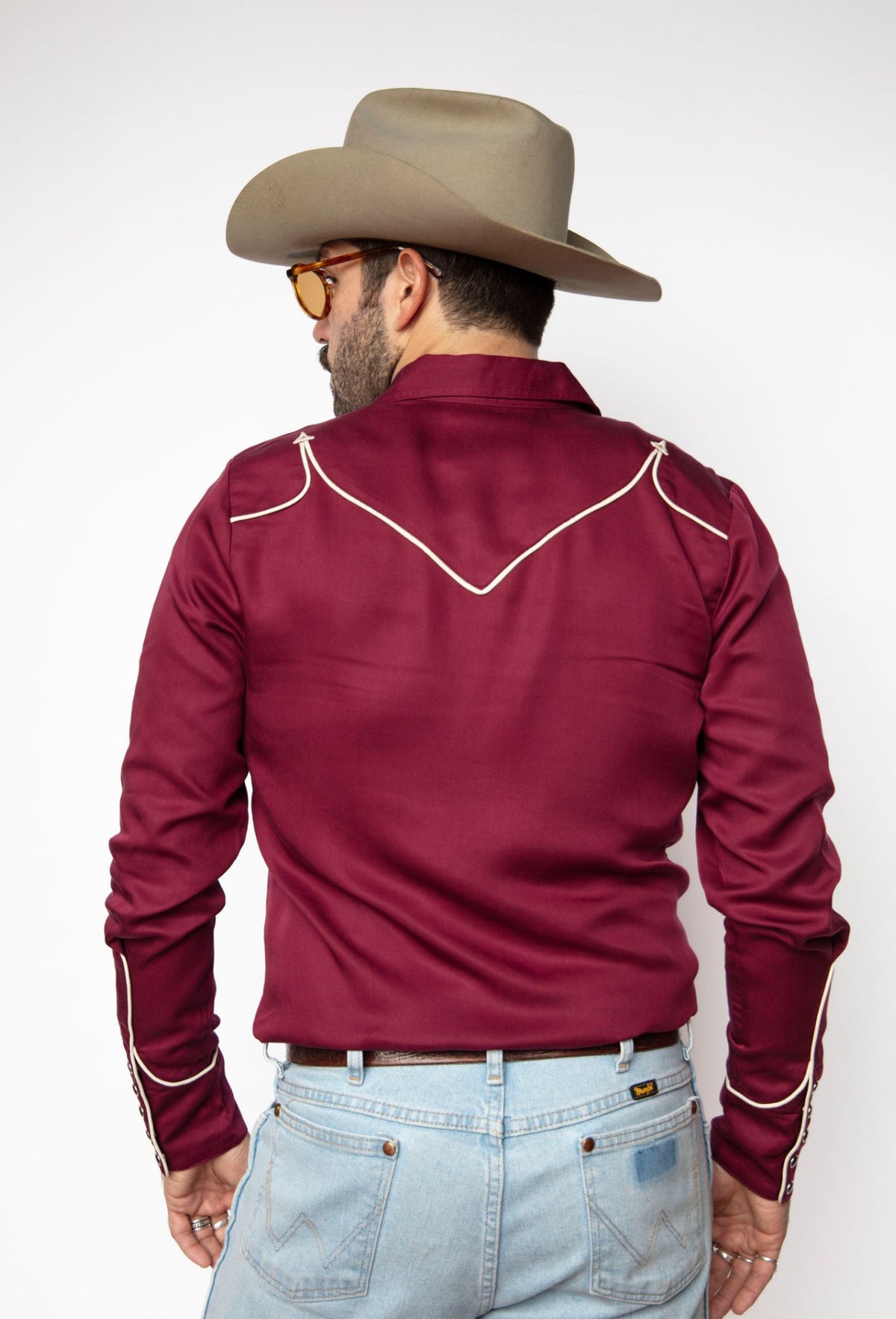 Back view of the H Bar C Reno maroon shirt with off white piped back yoke.