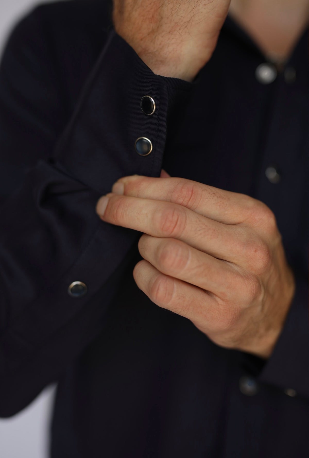 Close-up of the snap cuff on the H Bar C Denver men's navy western shirt.