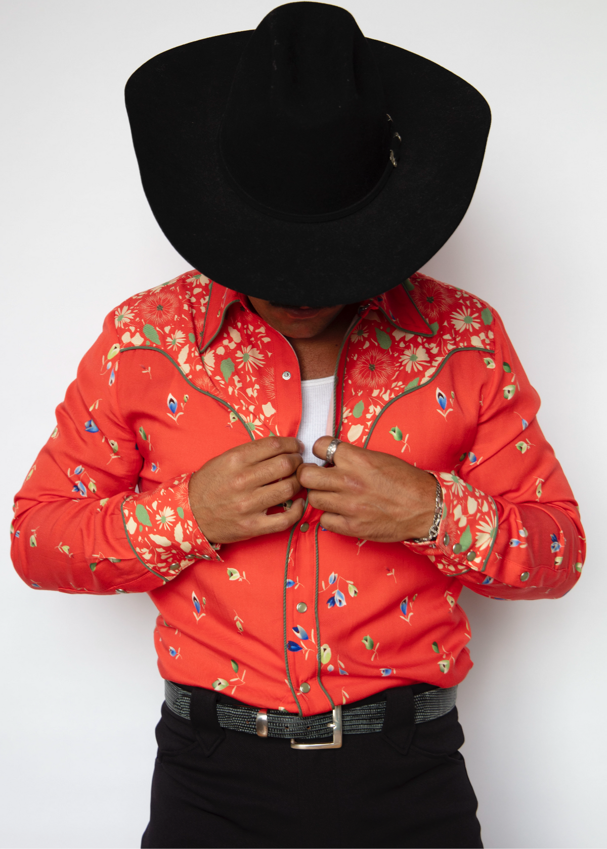 Front view of the H Bar C Midlands red floral print western shirt with pearl snaps and yoke.