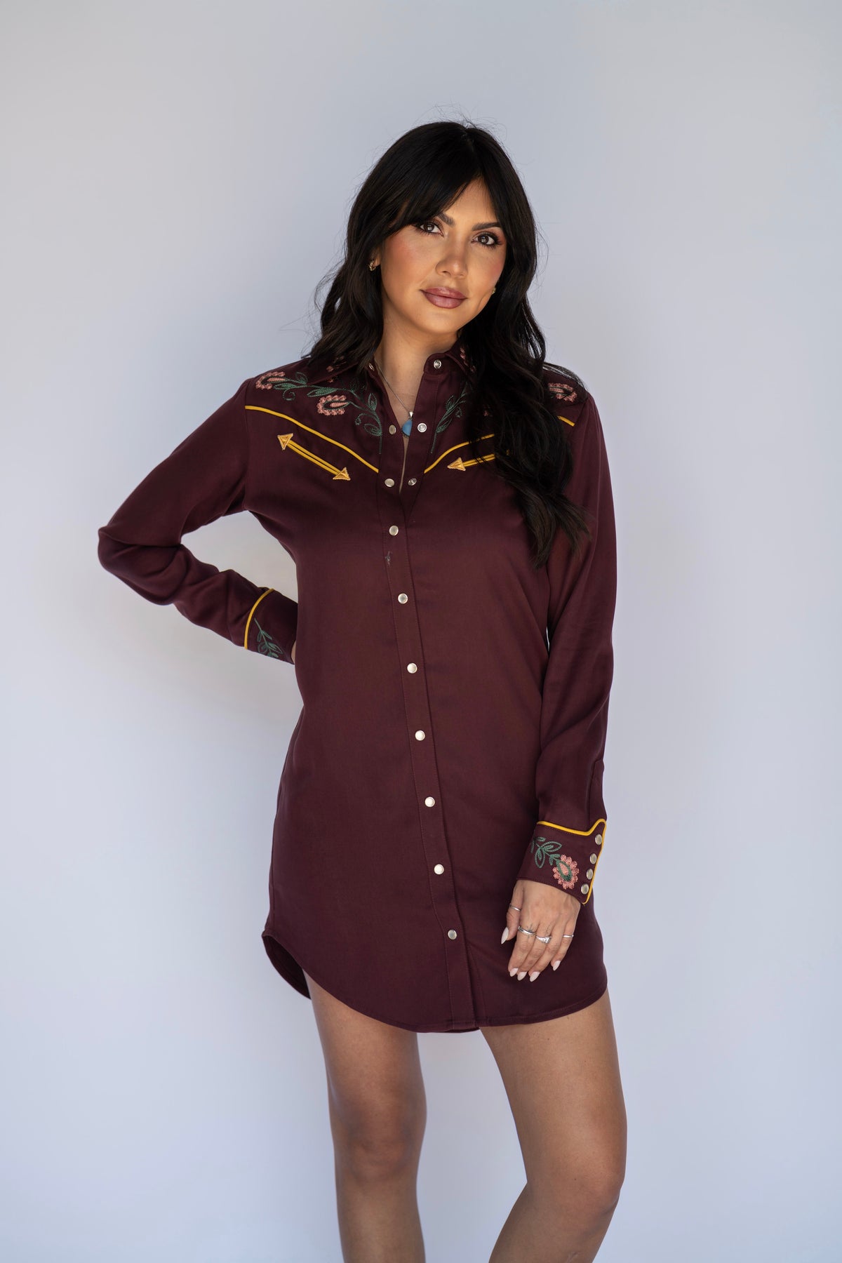 Model in the H Bar C Sedona maroon embroidered shirt dress.