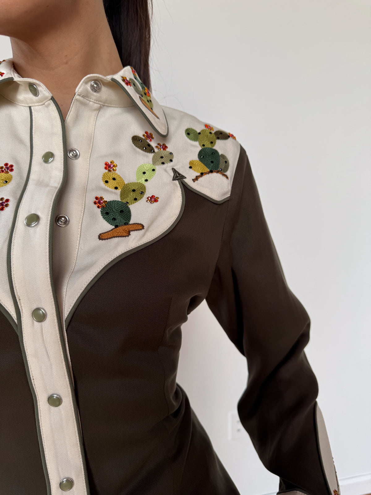 Close-up of the cactus chain stitch embroidery on the cream yoke of the H Bar C San Jose shirt.