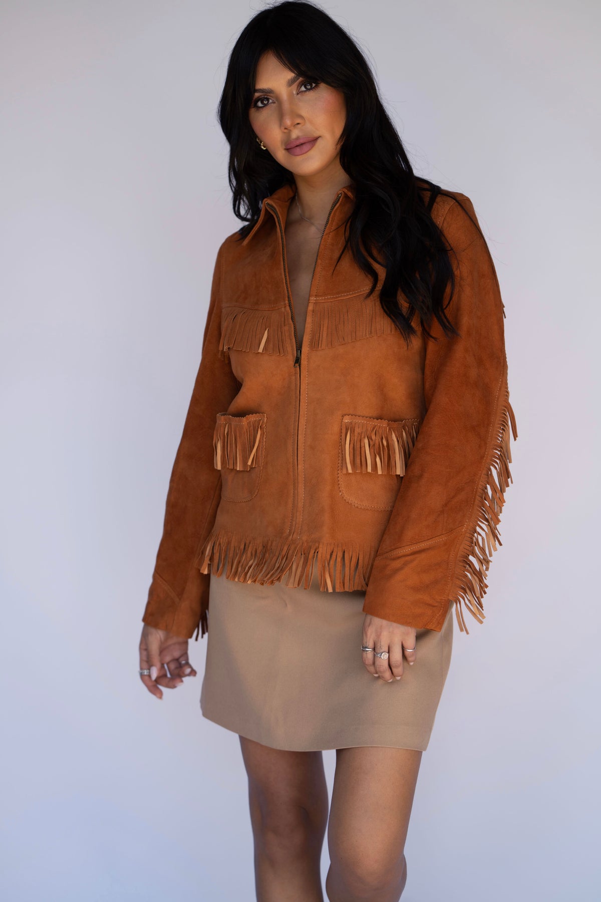 Front view of the H Bar C Omaha suede fringe jacket with half zip front and pockets.