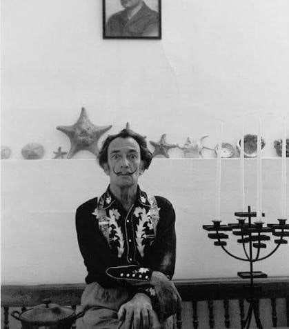 Vintage black and white photo of Salvador Dalí wearing an embroidered H Bar C western shirt, the inspiration for the Dali shirt.